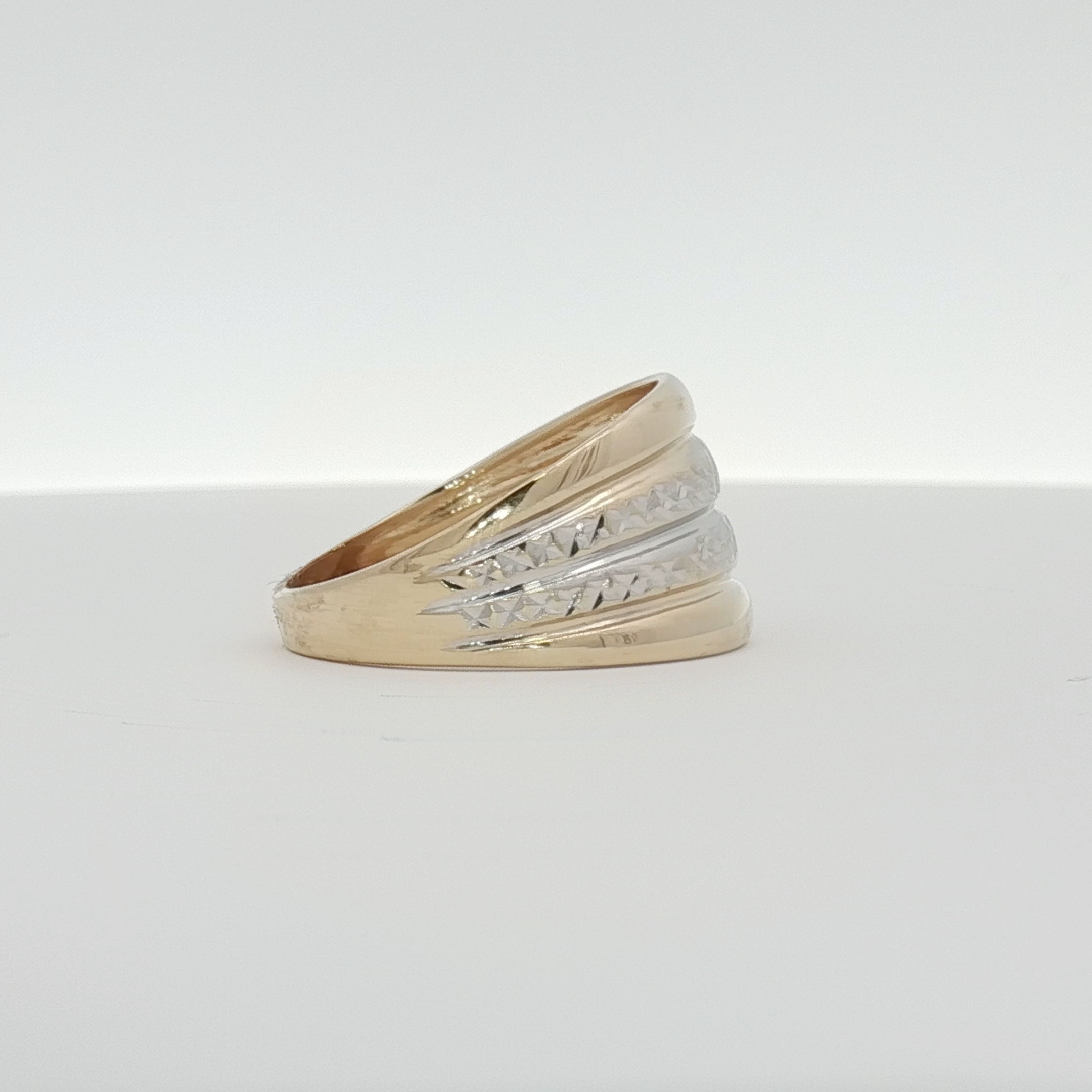 14K gold two-tone jewelry ring with mixed gold finishes, showcasing elegant design and craftsmanship.
