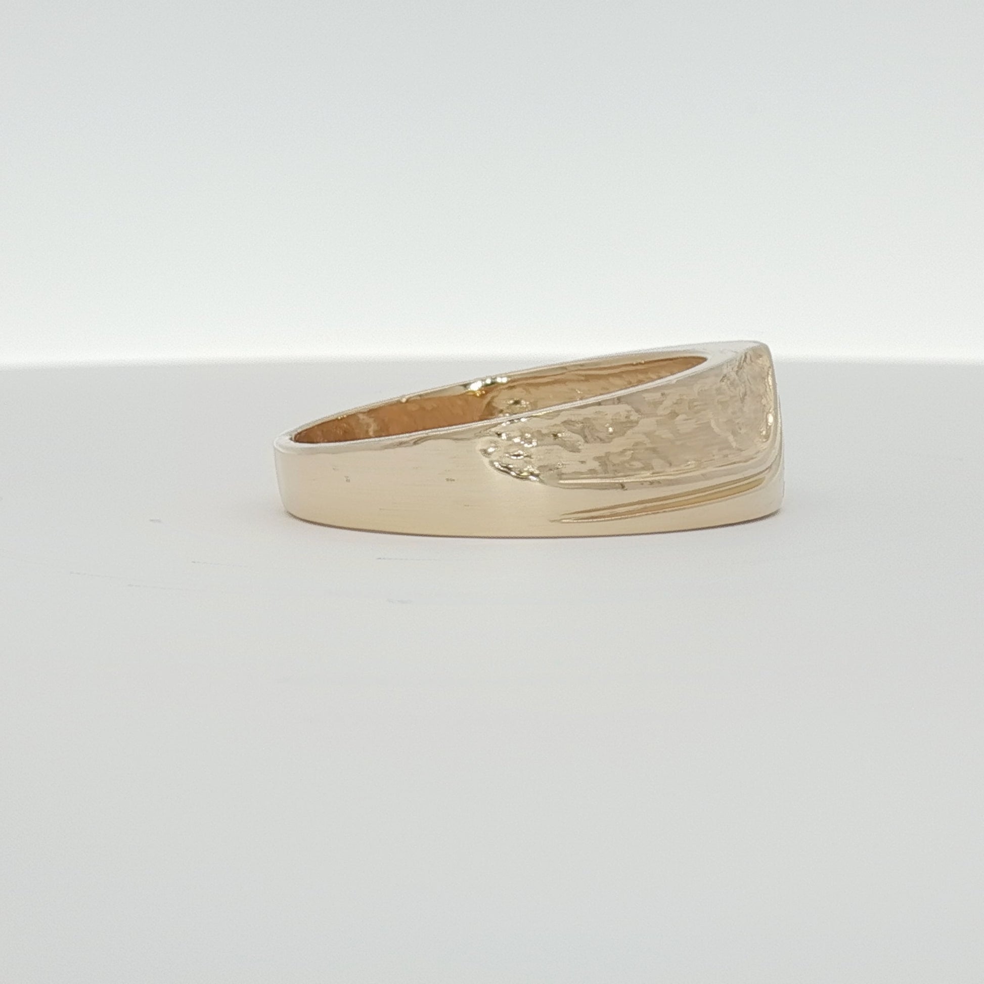 14K yellow gold diamond band ring with sparkling diamonds, showcasing elegant jewelry design from Gold & Beyond.