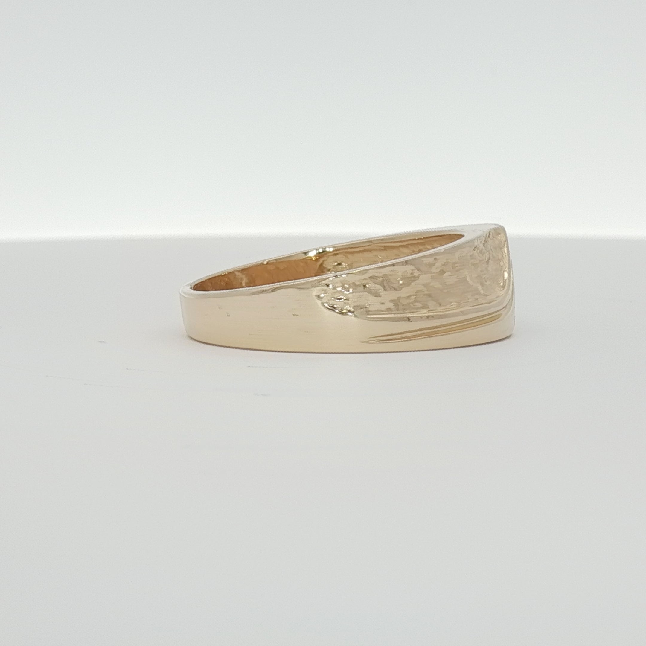 14K yellow gold diamond band ring with sparkling diamonds, showcasing elegant jewelry design from Gold & Beyond.