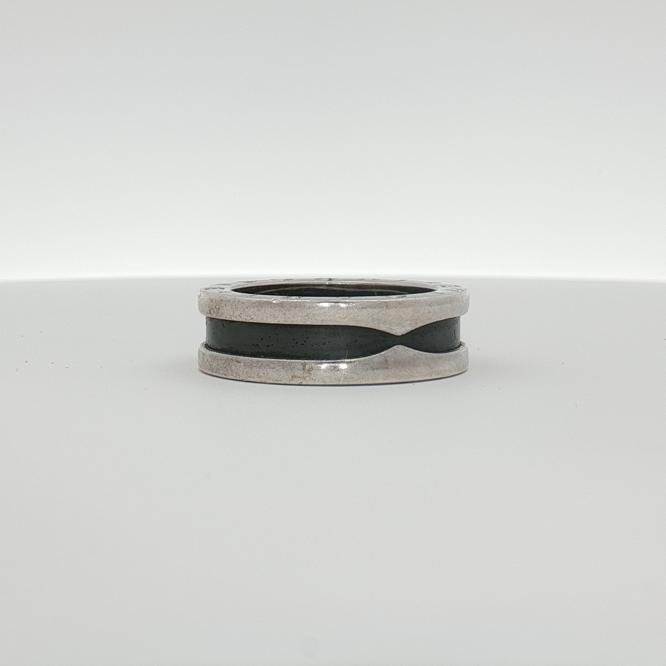 Gold & Beyond Bulgari Save the Children jewelry ring with intricate design and branding details visible in the image.