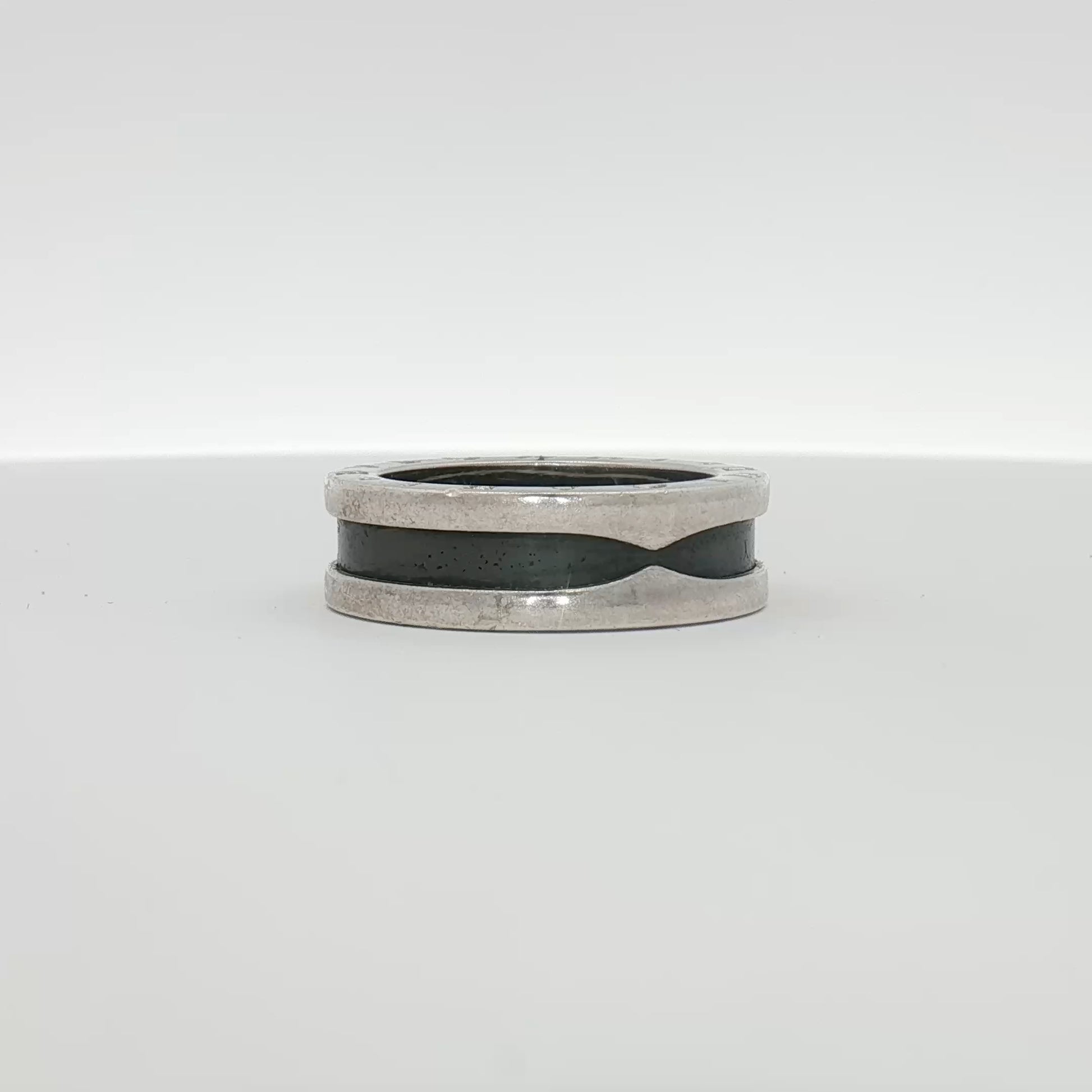 Gold & Beyond Bulgari Save the Children ring, elegant jewelry piece with intricate design and a symbolic motif.