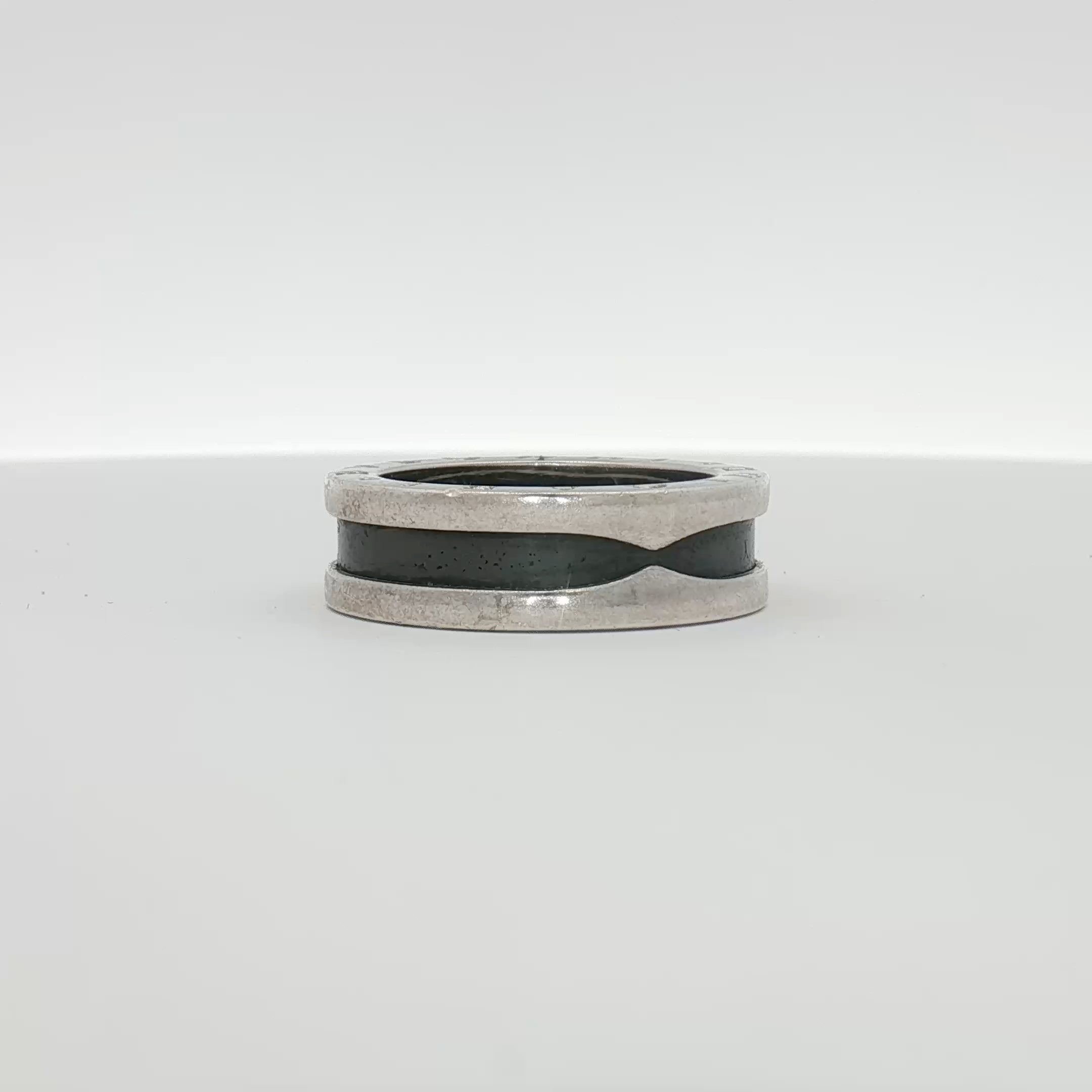Gold & Beyond Bulgari Save the Children ring, elegant jewelry piece with intricate design and a symbolic motif.