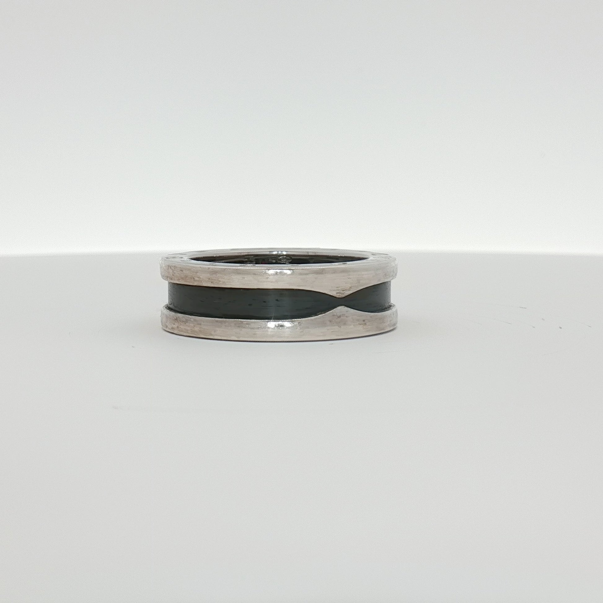 Gold and Beyond Bulgari Save the Children jewelry ring featuring a sleek gold band and intricate design.