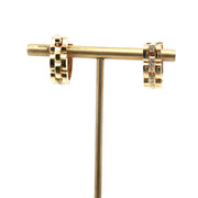 Cartier 18K yellow gold diamond cufflinks, elegant jewelry accessory with sparkling diamonds and polished gold finish.