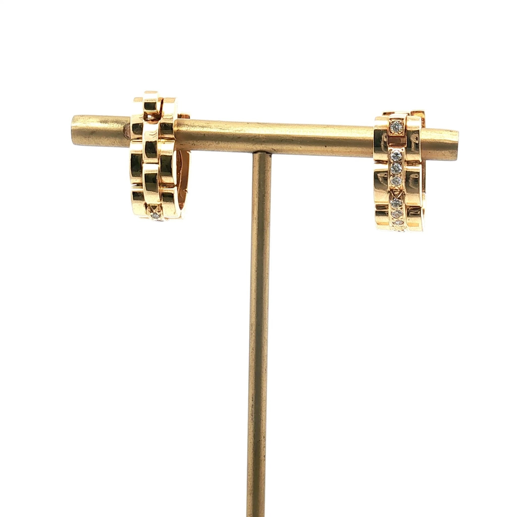 Cartier 18K yellow gold diamond cufflinks, elegant jewelry accessory with sparkling diamonds and polished gold finish.