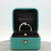 Gold & Beyond Tiffany & Co. Return to Tiffany T diamond ring, elegant jewelry piece with a signature design and sparkling accents.
