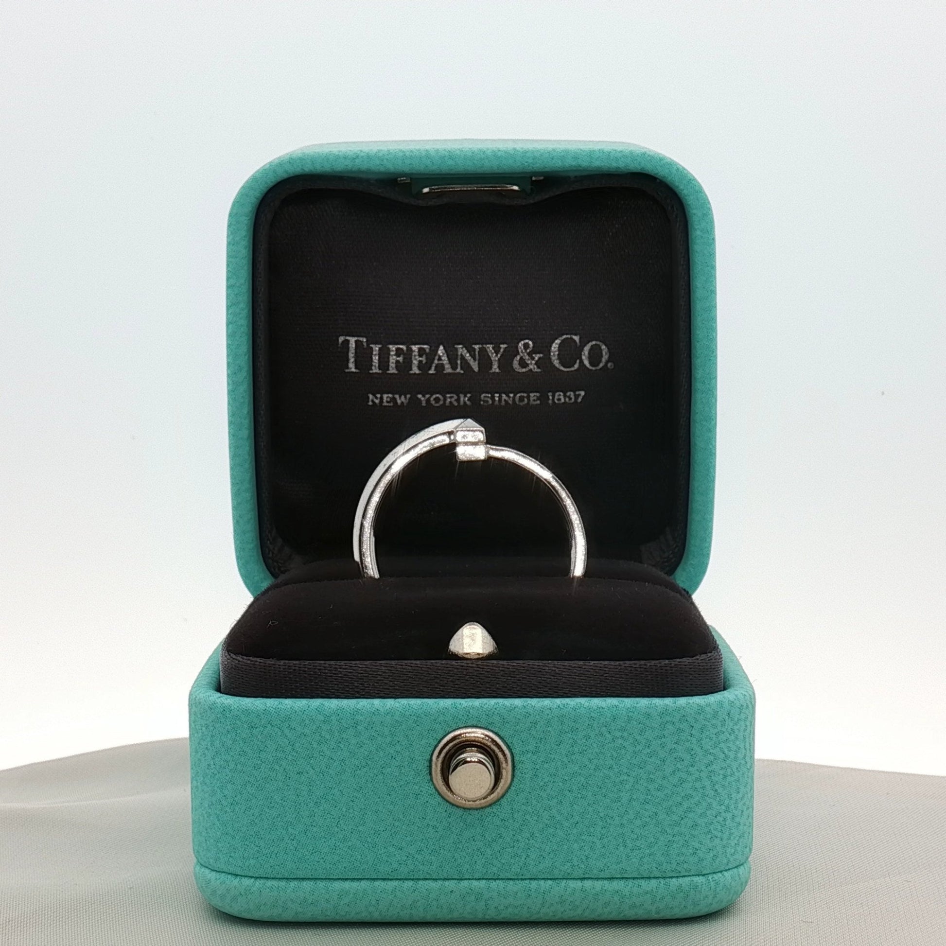 Gold & Beyond Tiffany & Co. Return to Tiffany T diamond ring, elegant jewelry piece with a signature design and sparkling accents.
