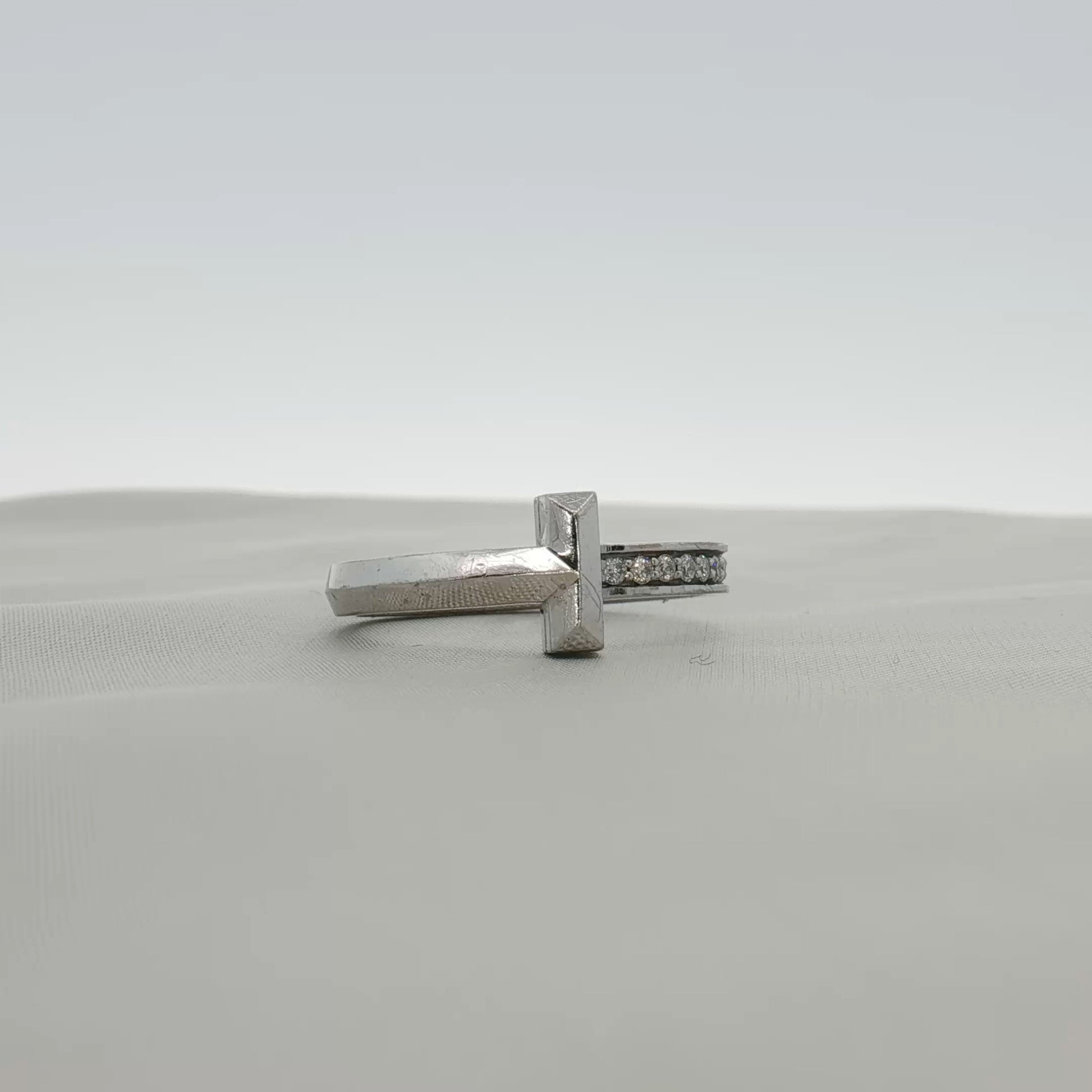 Gold & Beyond Tiffany & Co. Return to Tiffany T diamond ring, elegant jewelry with iconic design and sparkling diamonds.