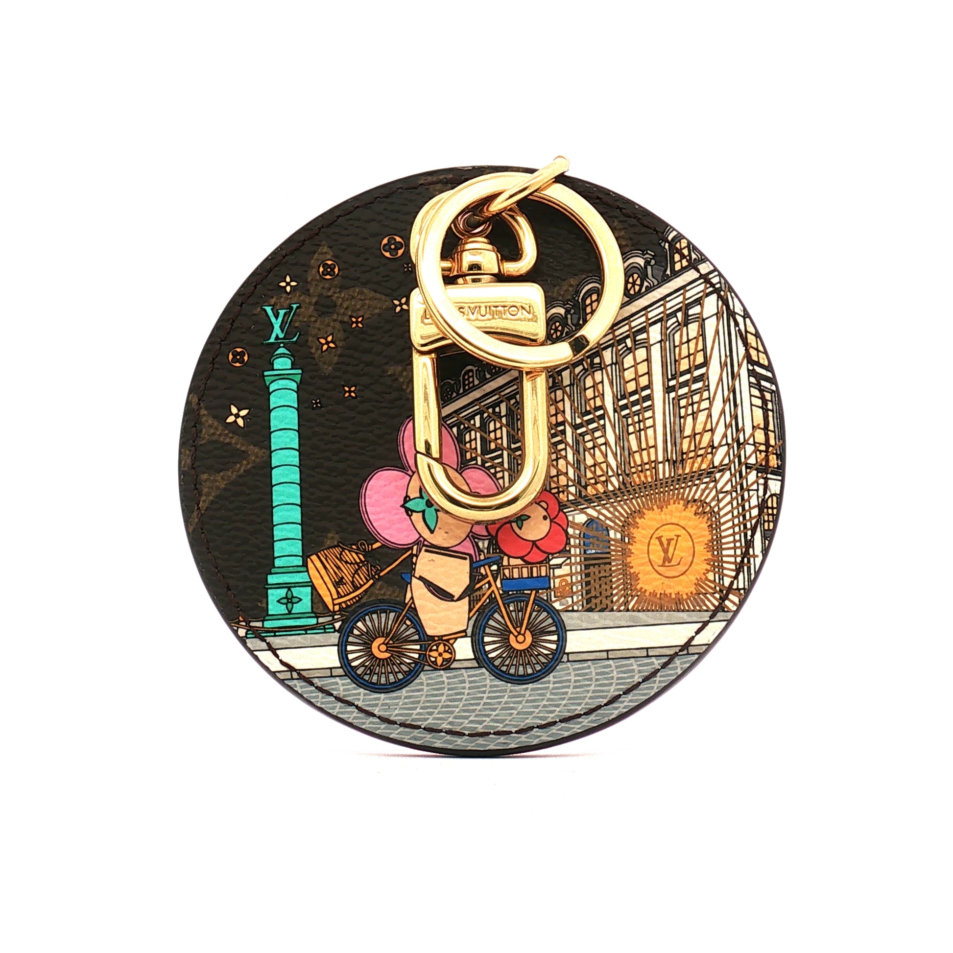 Louis Vuitton Illustre Christmas Paris bag charm and key holder with gold accents, featuring festive holiday design and intricate details.