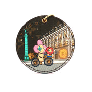 Louis Vuitton Illustre Christmas Paris bag charm and key holder, gold and silver accessories with festive design and intricate details.