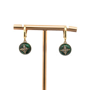 Louis Vuitton Blossom Malachite diamond drop earrings in 18K yellow gold featuring floral design and sparkling gemstones.