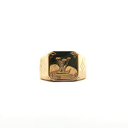 Louis Vuitton gold-tone monogram signet ring showcasing the jewelry's elegant design and brand logo detail.