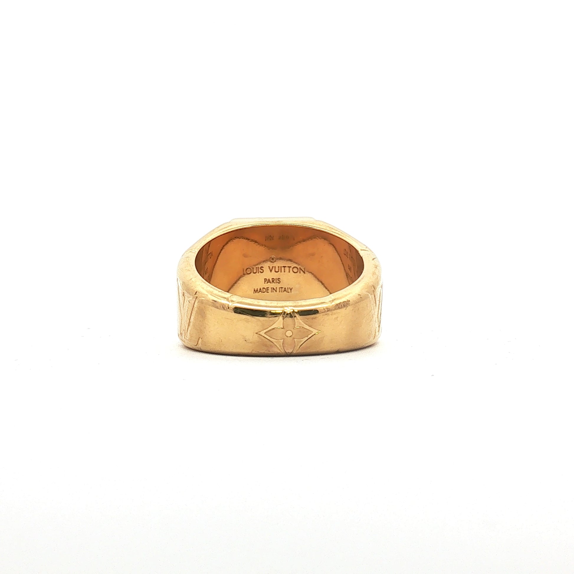 Louis Vuitton gold-tone monogram signet ring from Gold & Beyond, featuring a detailed LV logo design on a polished jewelry piece.