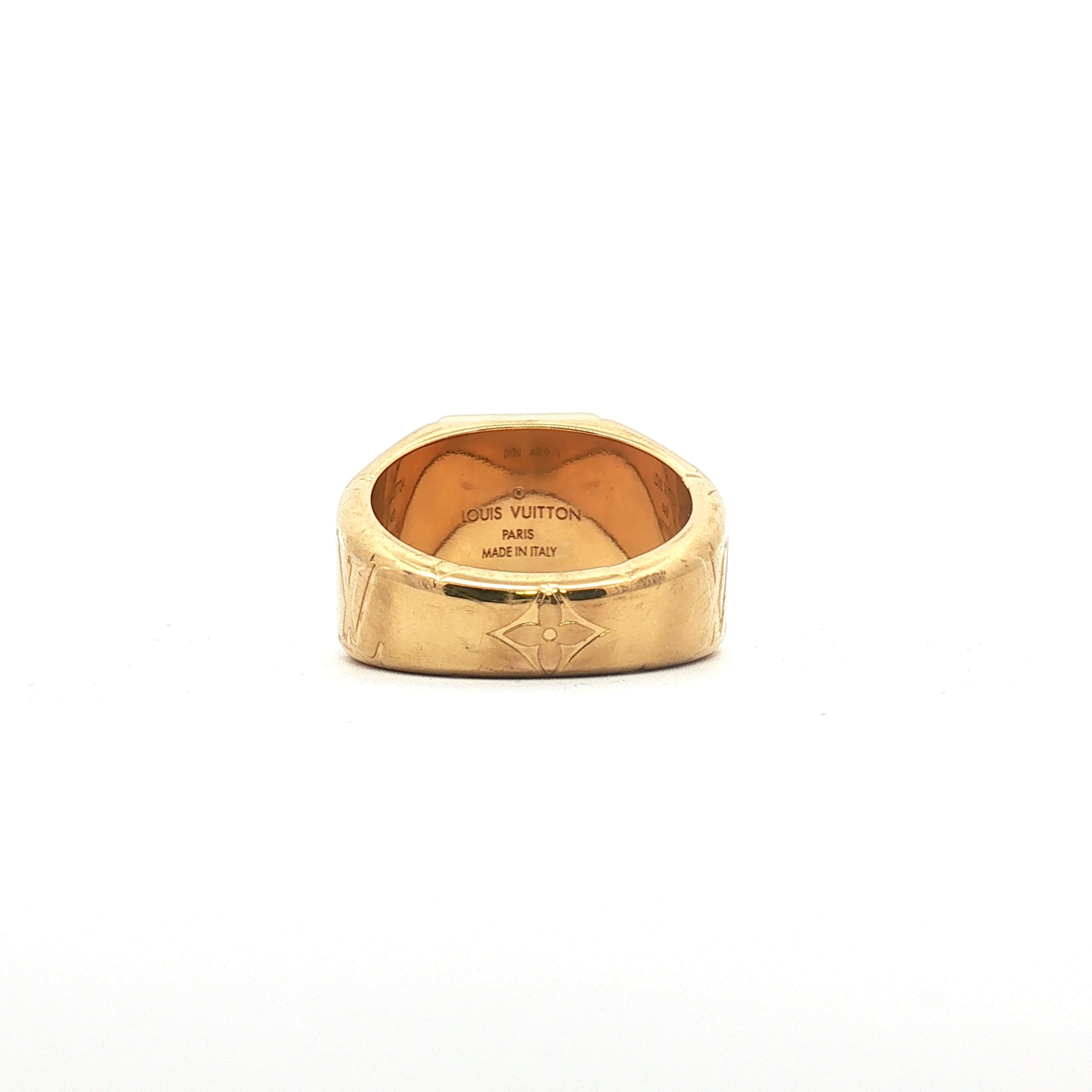Louis Vuitton gold-tone monogram signet ring from Gold & Beyond, featuring a detailed LV logo design on a polished jewelry piece.