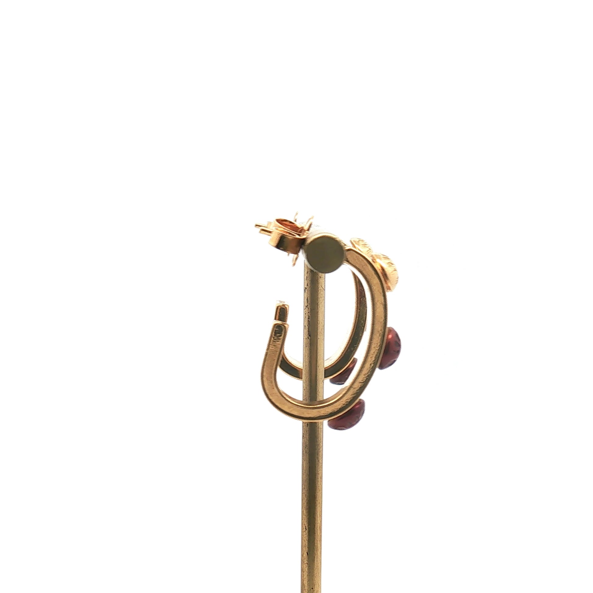 Louis Vuitton gold-tone red resin hoop earrings, stylish jewelry with bold circular design and polished finish.