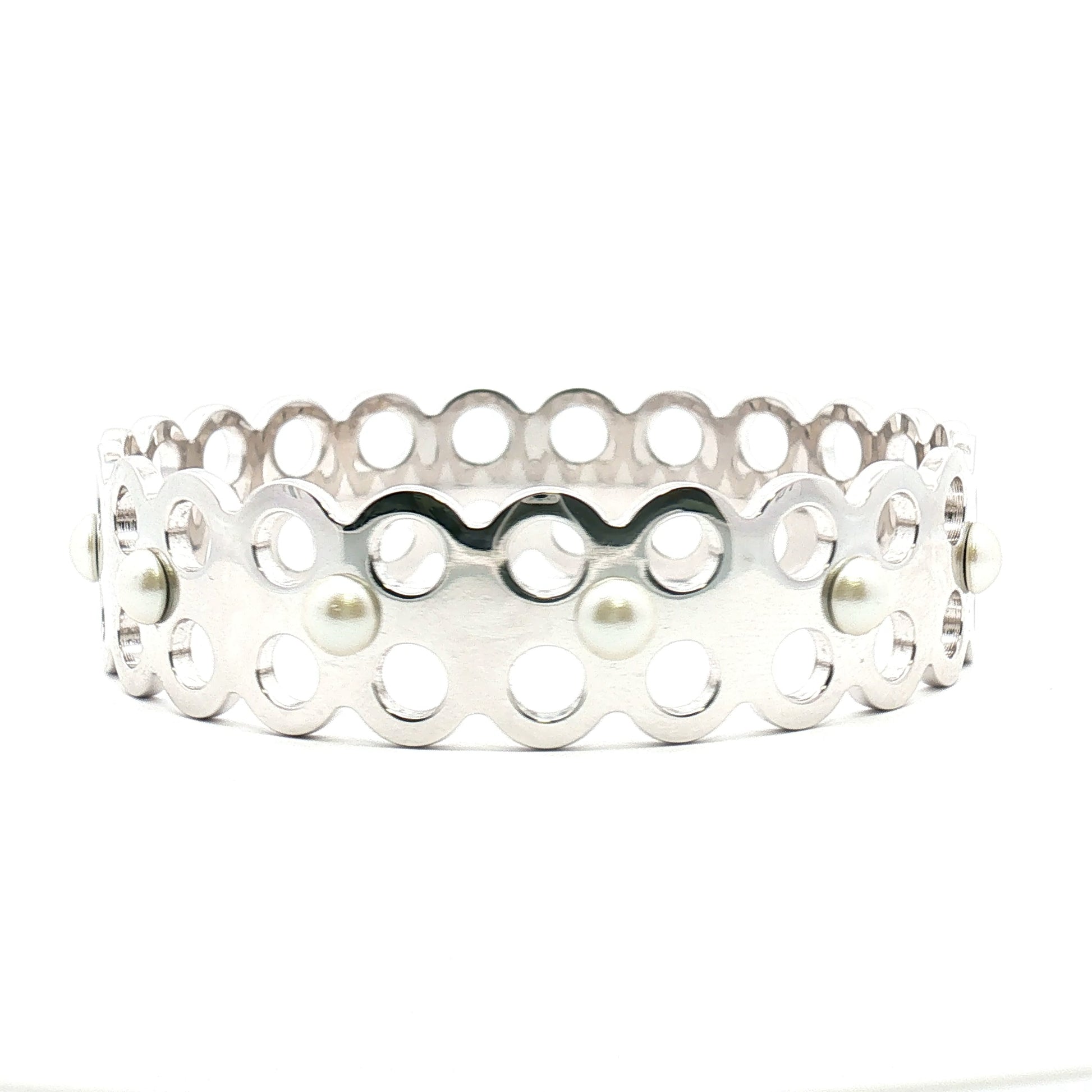 Louis Vuitton Hide and Seek faux pearl bracelet featuring gold-tone jewelry with elegant faux pearl accents.