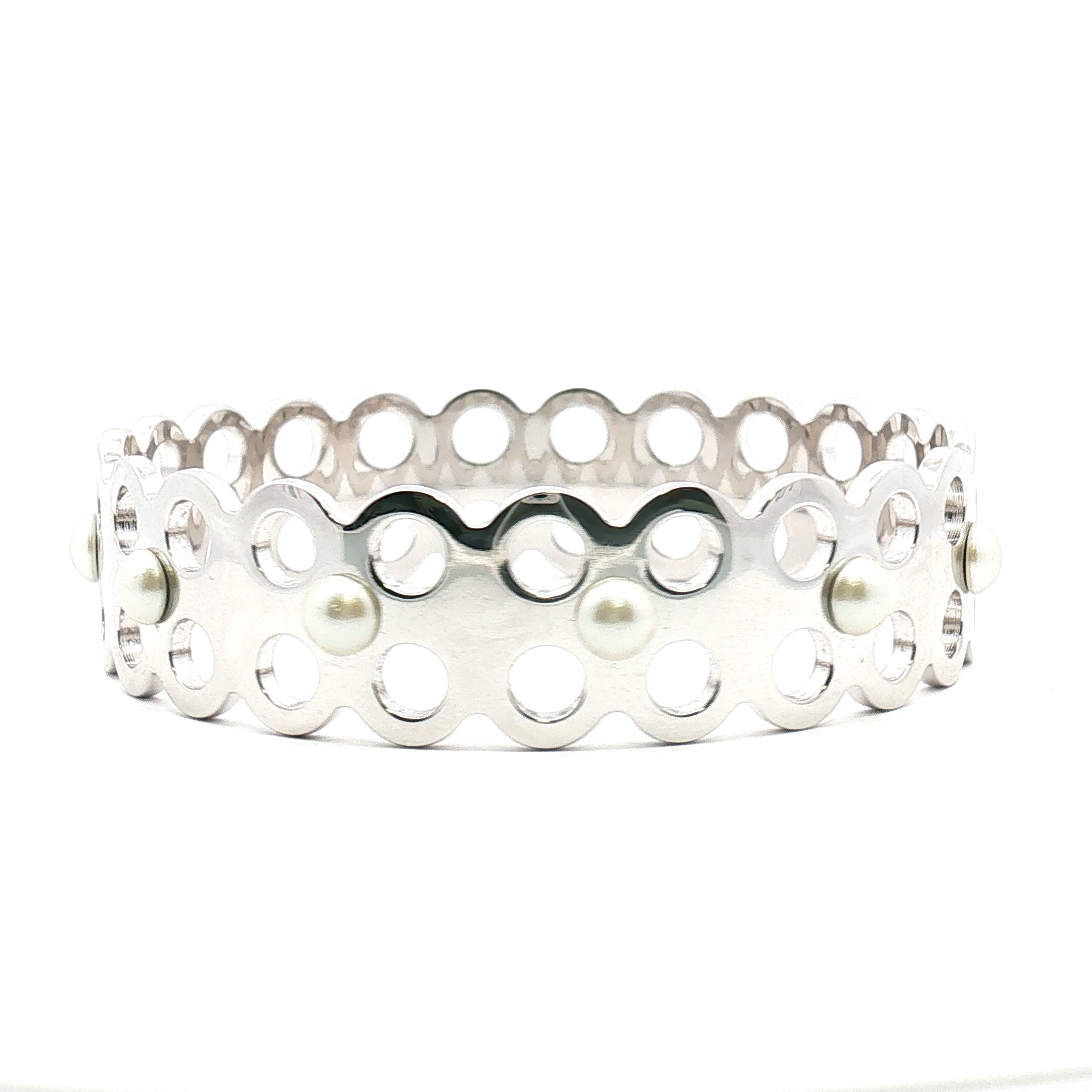 Louis Vuitton Hide and Seek faux pearl bracelet featuring gold-tone jewelry with elegant faux pearl accents.