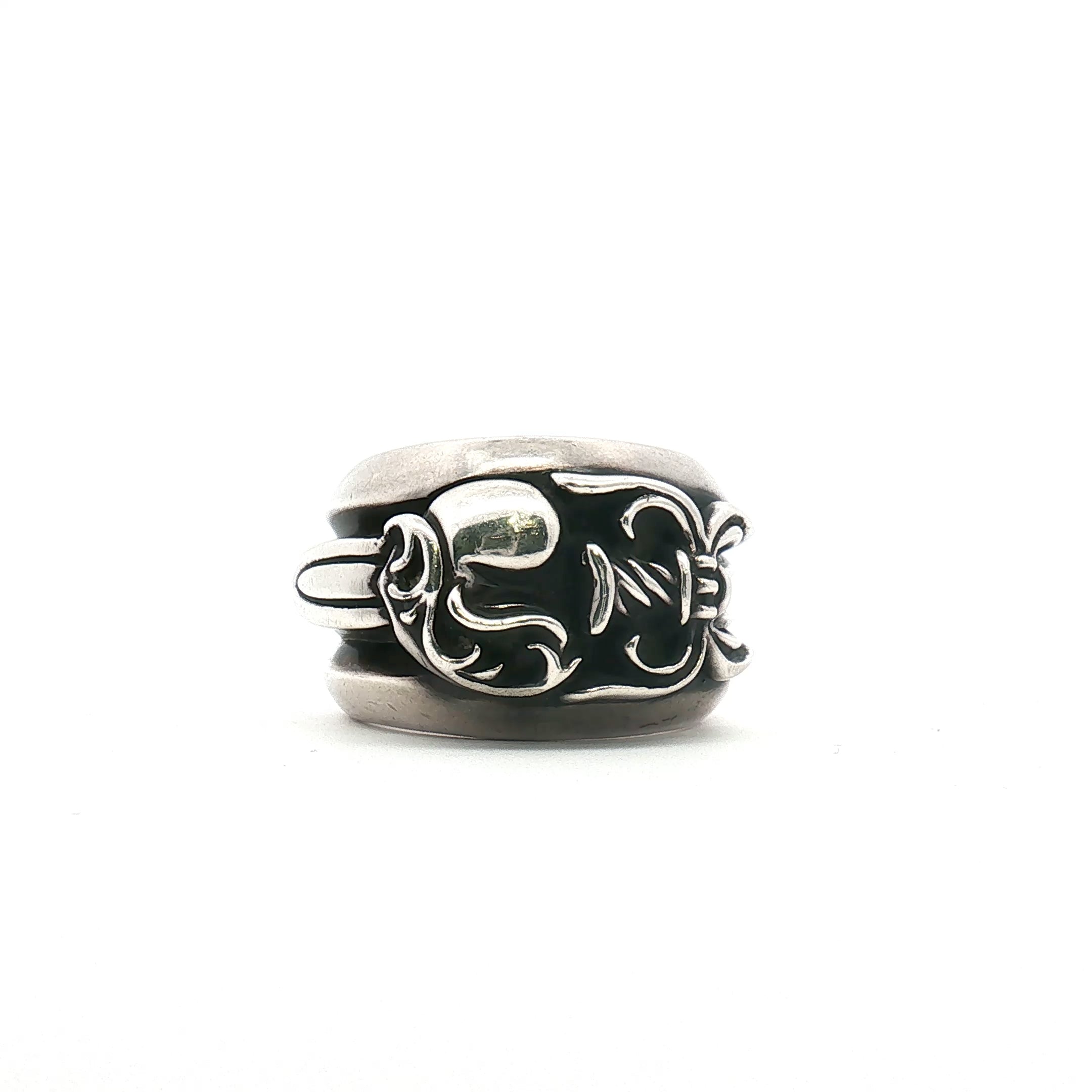 Gold & Beyond Chrome Hearts Hearts Dagger Ring, silver jewelry featuring a heart and dagger design, close-up shot showing intricate details.
