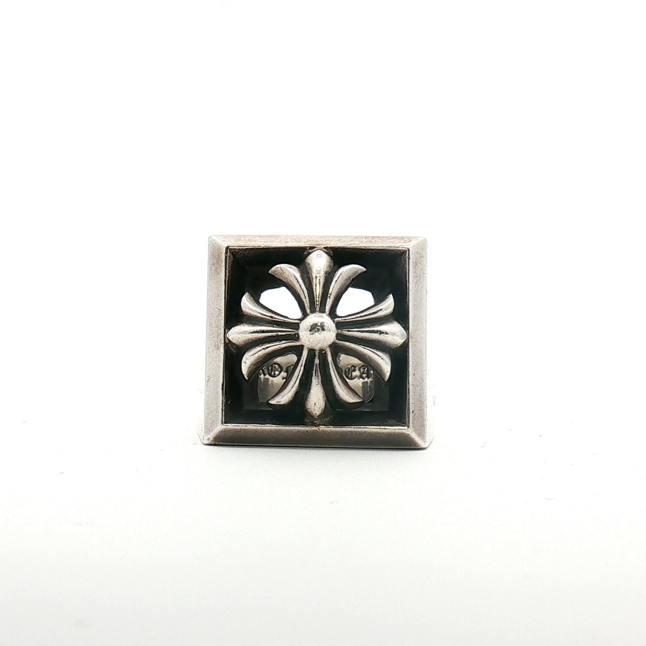 Chrome Hearts open cross signet ring, gold and silver jewelry with detailed cross design, showcasing craftsmanship and bold style.