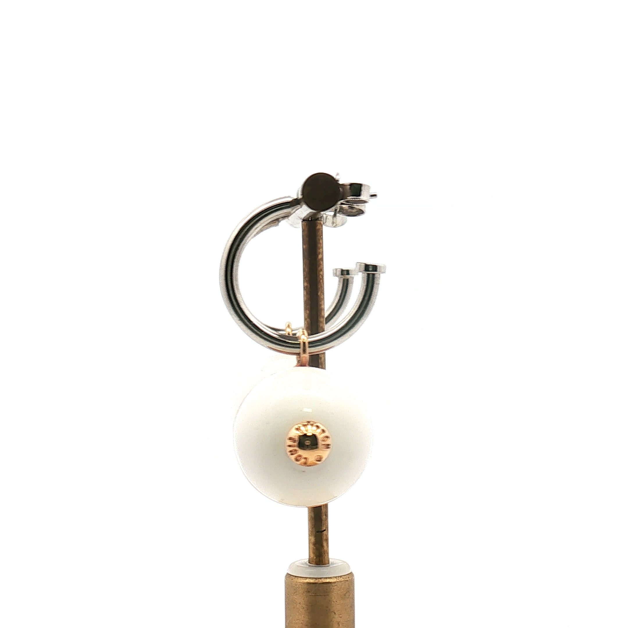 Louis Vuitton two-tone ball drop earrings in gold and silver jewelry with elegant design, displayed on a white background.