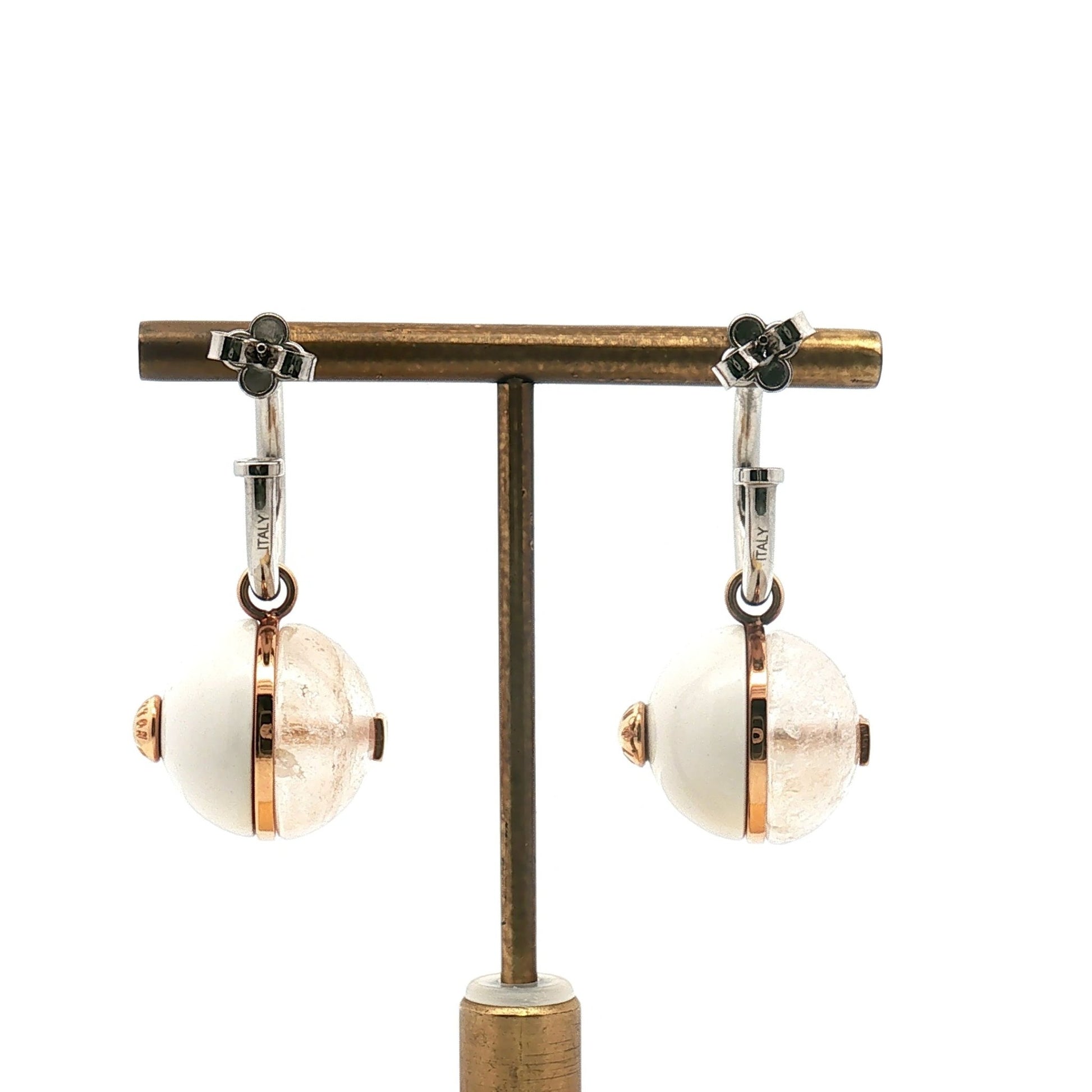 Louis Vuitton two-tone ball drop earrings in gold and silver jewelry with elegant round design and dangling sphere accents.