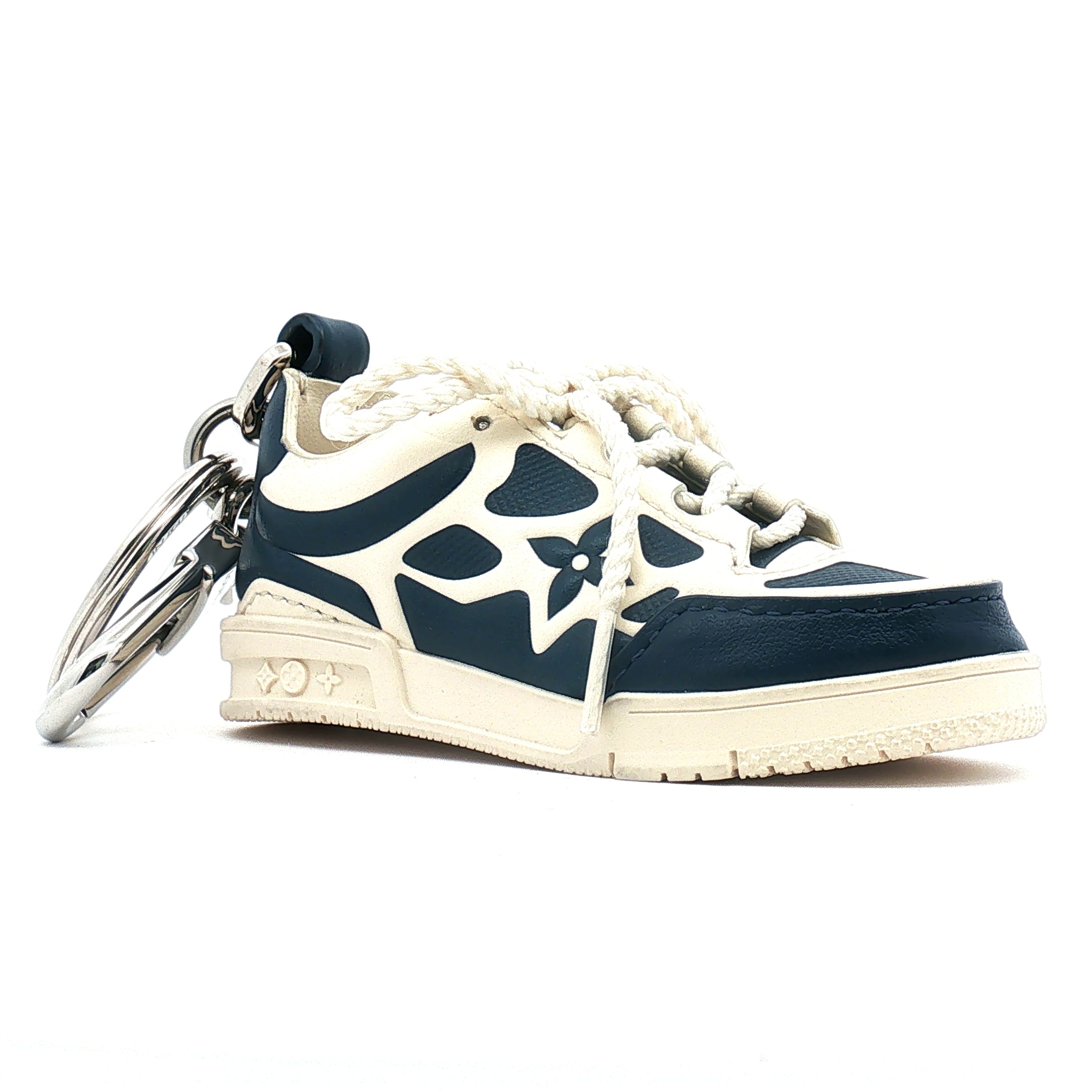 Louis Vuitton LV Trainer sneaker-themed bag charm and key holder by Gold & Beyond, featuring detailed design and high-quality craftsmanship.