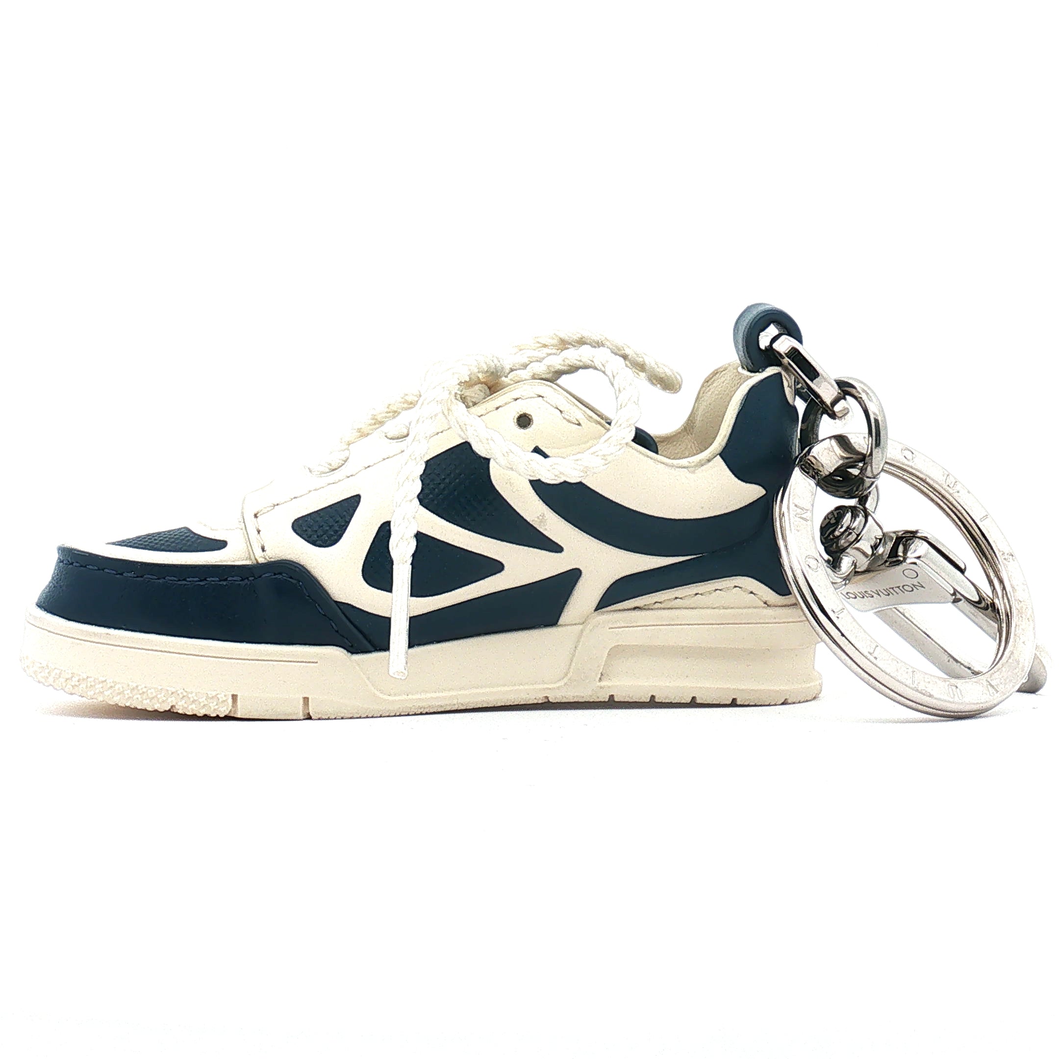 Louis Vuitton LV Trainer sneaker bag charm and key holder by Gold & Beyond, featuring a detailed sneaker replica accessory.