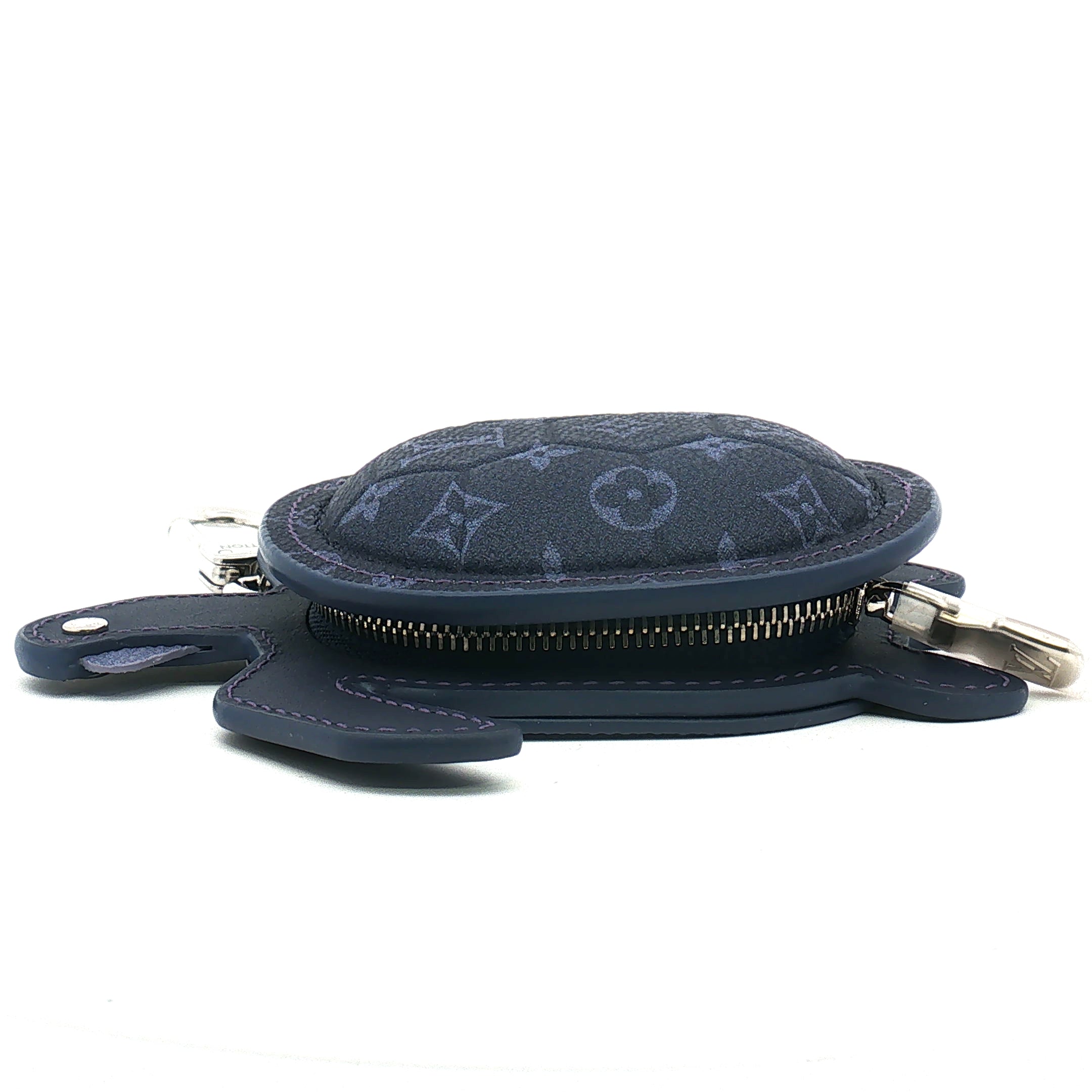 Louis Vuitton Navy LV Turtle Pouch Bag Charm, gold accessories, detailed logo design, attached to a bag or display.