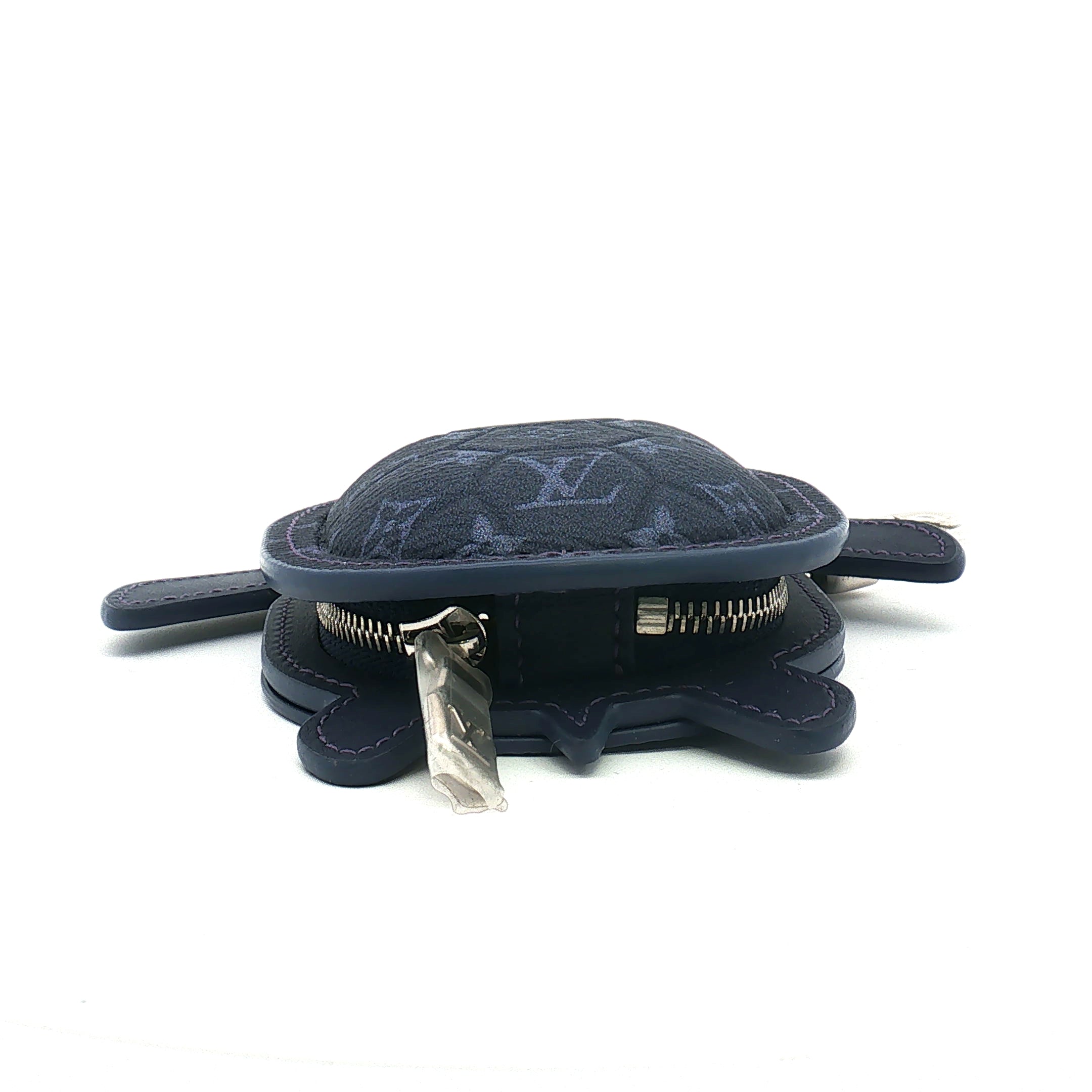 Louis Vuitton Navy LV Turtle Pouch Bag Charm, Gold & Beyond accessories, detailed close-up of the navy blue pouch with turtle design.