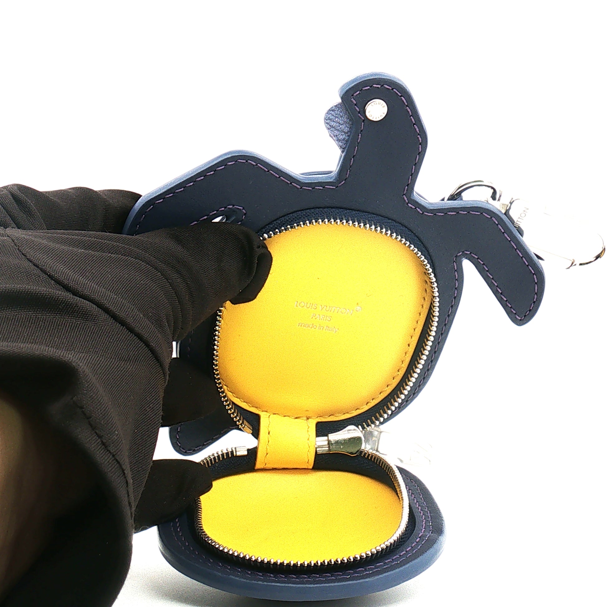 Louis Vuitton navy LV turtle pouch bag charm accessory with gold accents, displayed against a neutral background.