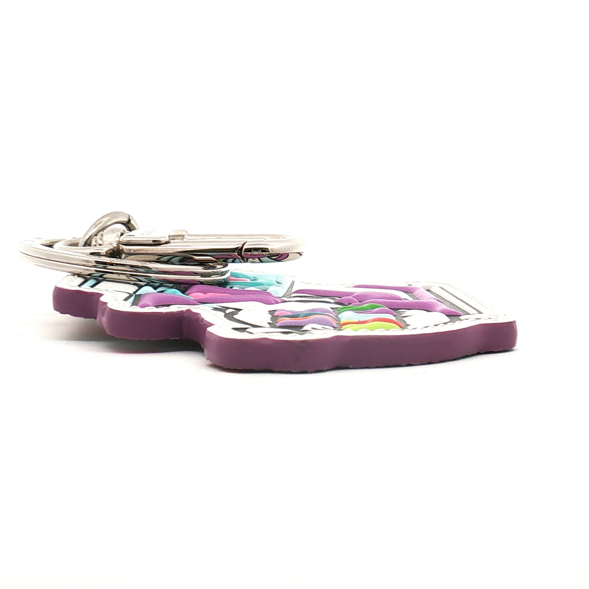 Louis Vuitton Comics bag charm and key ring accessory with colorful cartoon design, gold hardware, and branded details.