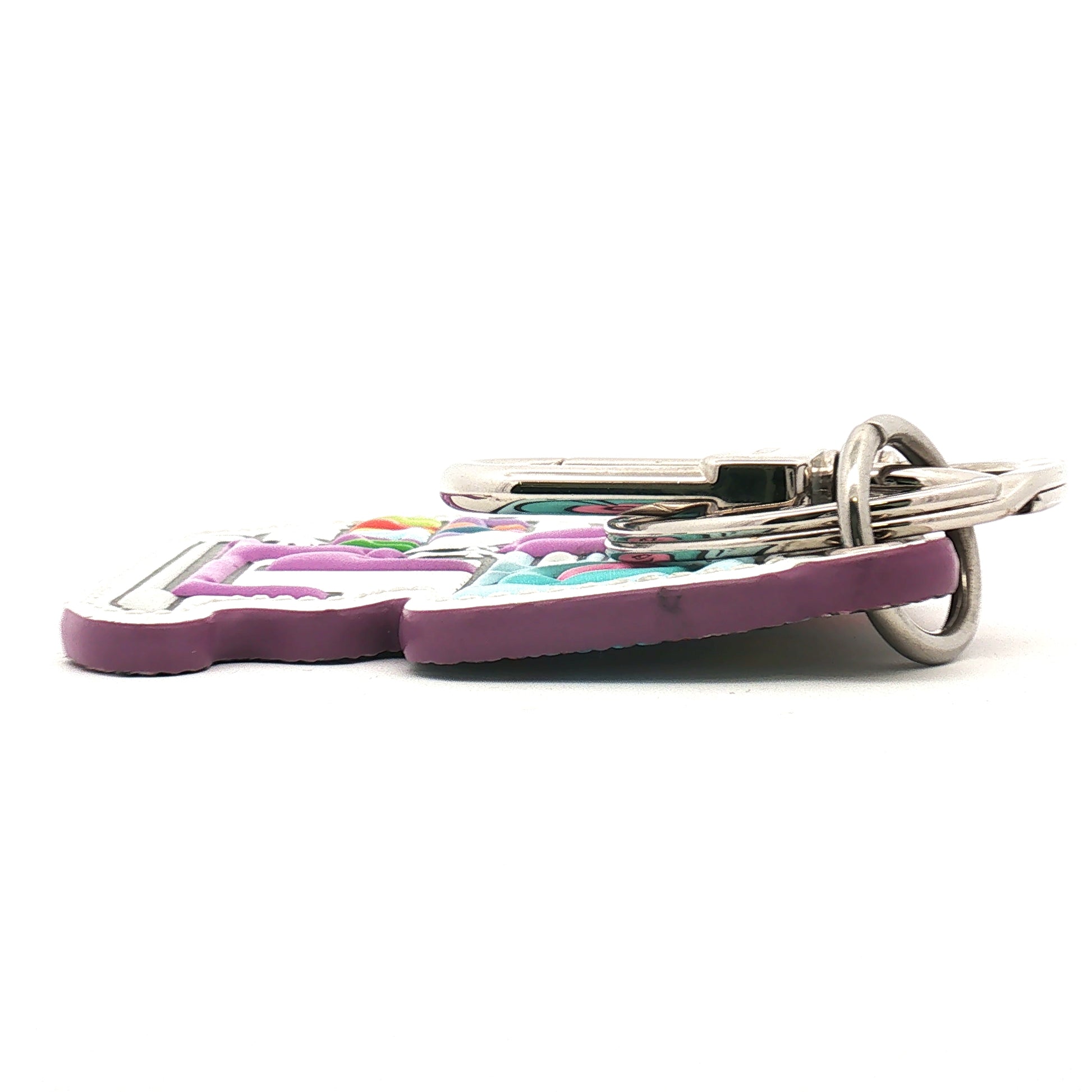 Louis Vuitton Comics Bag Charm and Key Ring accessory with colorful cartoon design and gold-tone hardware.