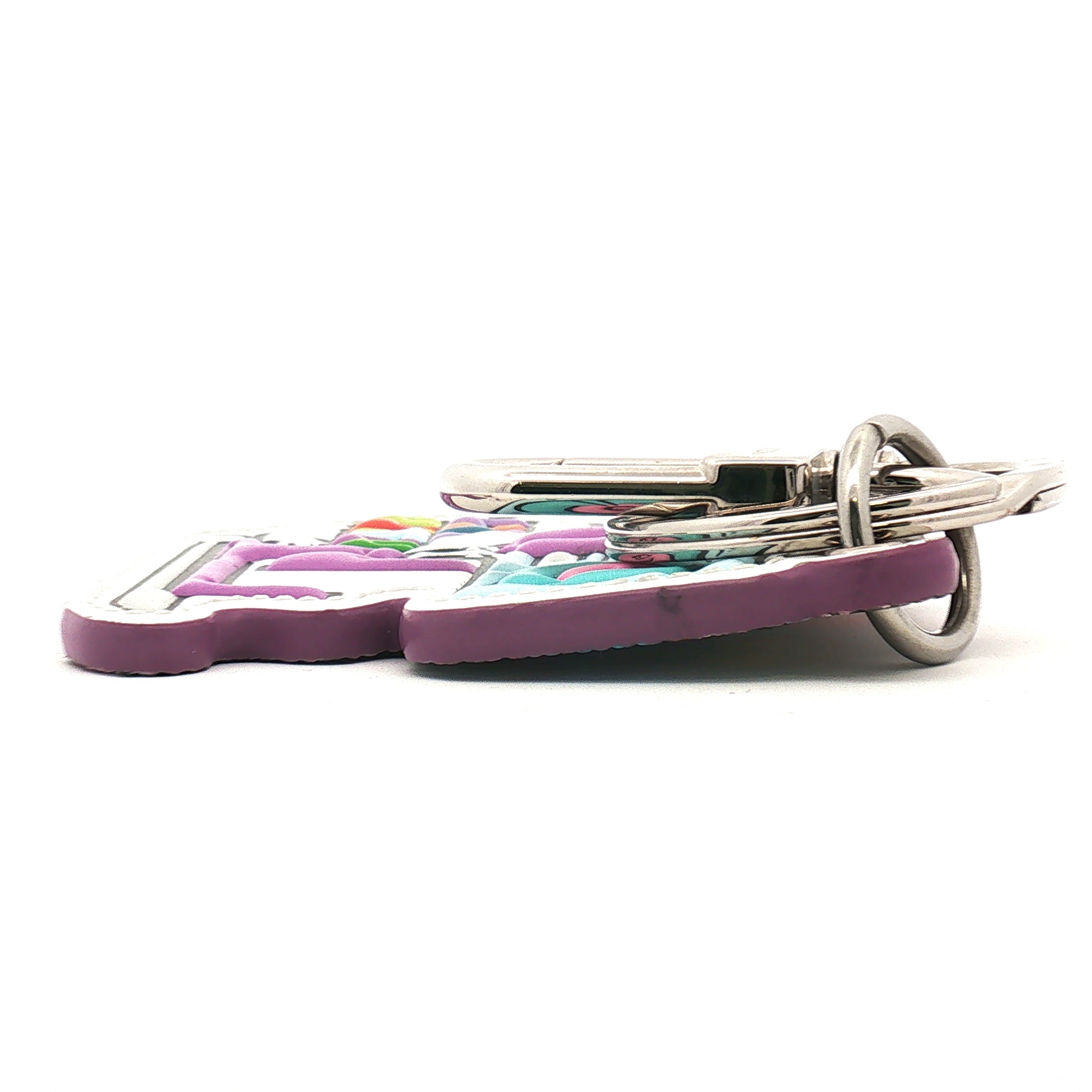 Louis Vuitton Comics Bag Charm and Key Ring accessory with colorful cartoon design and gold-tone hardware.