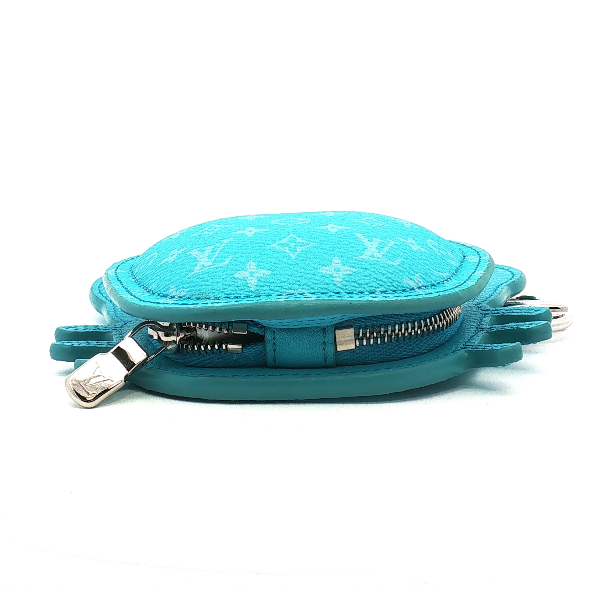 Louis Vuitton baby blue LV crab bag charm and zipper pouch accessory by Gold & Beyond, featuring detailed crab design and gold accents.