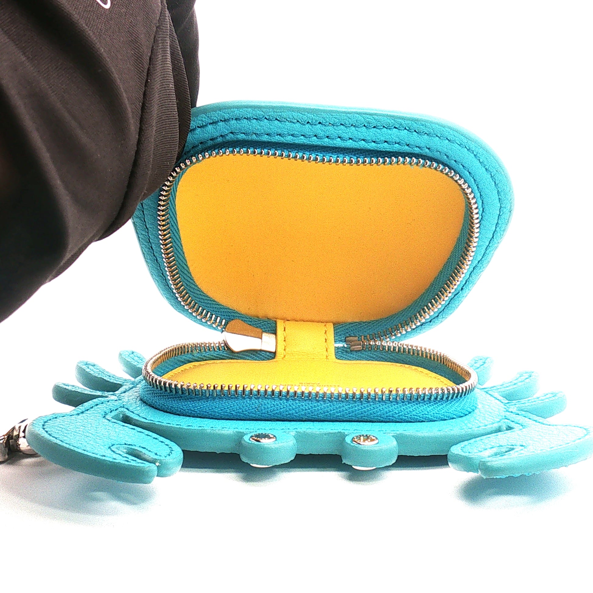 Louis Vuitton baby blue LV crab bag charm zipper pouch accessory by Gold & Beyond with detailed crab design and zipper closure.