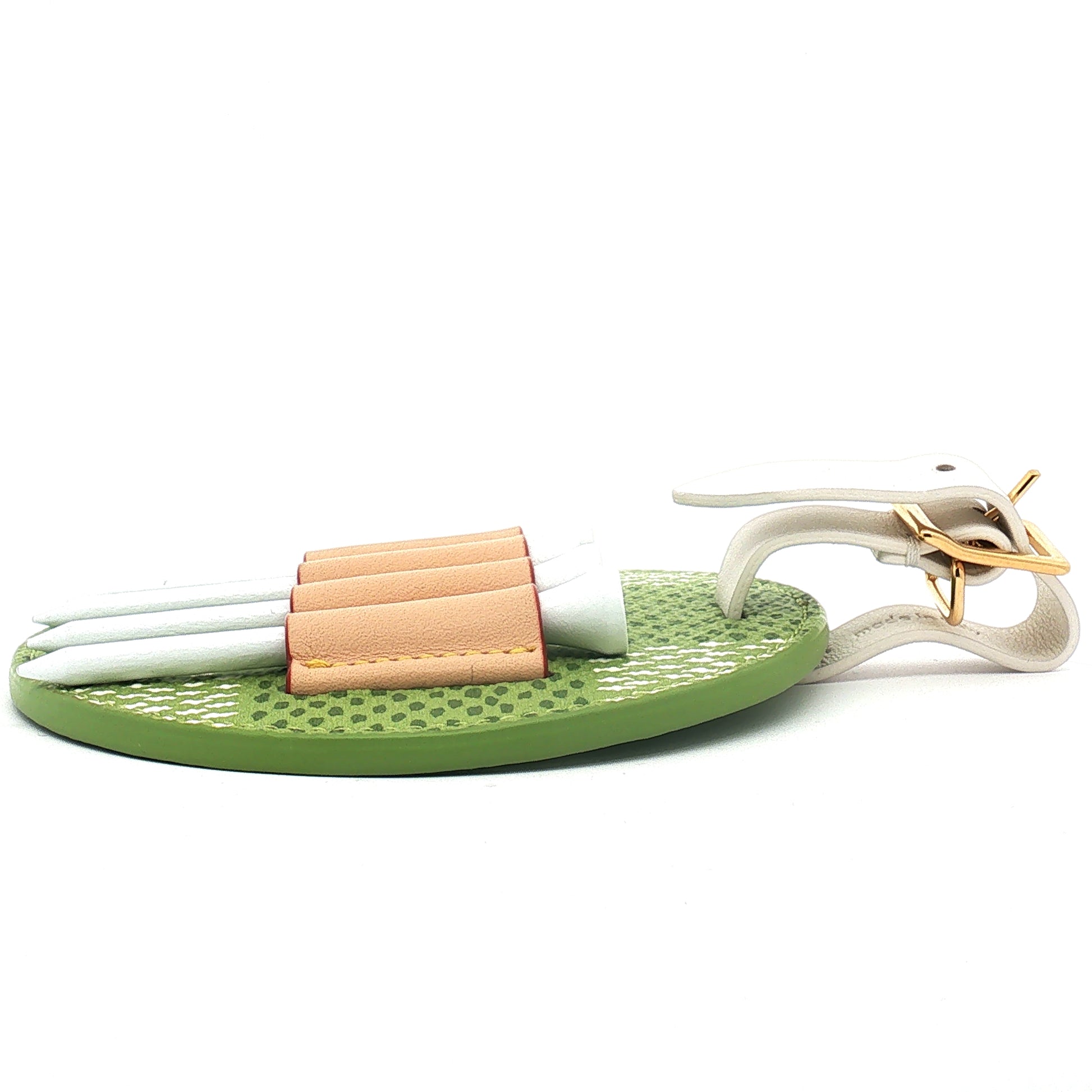 Louis Vuitton golf tee holder bag charm by Gold & Beyond, featuring a stylish accessory with the LV logo and gold-tone details.