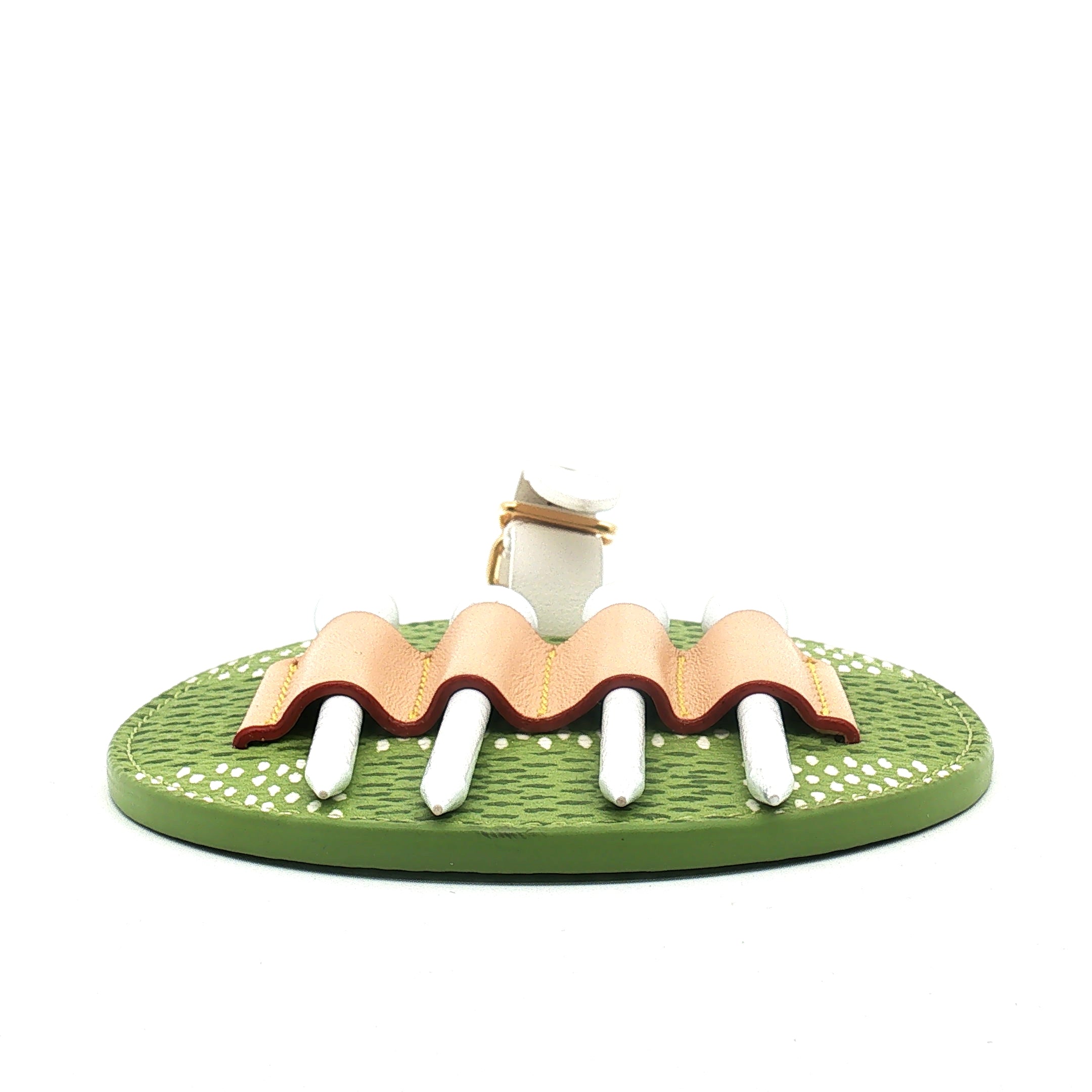 Louis Vuitton Golf Tee Holder Bag Charm by Gold & Beyond, a luxury accessories piece with a stylish logo design and metal details.