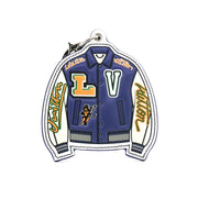 Gold & Beyond Louis Vuitton varsity jacket bag charm accessory featuring a stylish varsity jacket design.