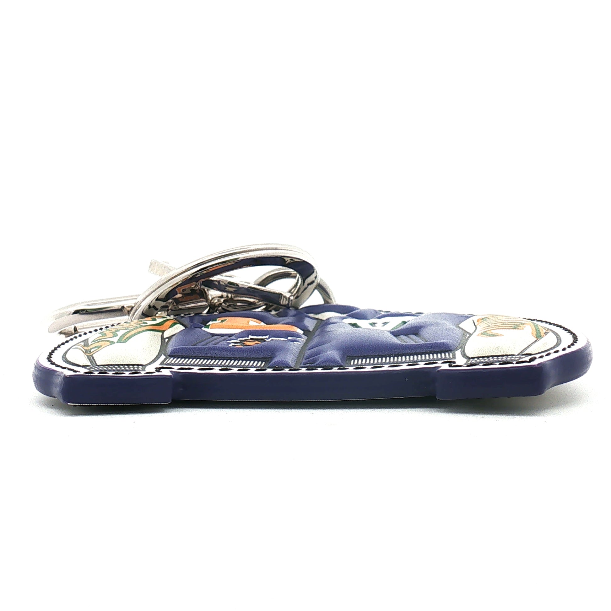Gold & Beyond Louis Vuitton varsity jacket bag charm accessory with detailed embroidered design and metal hardware.