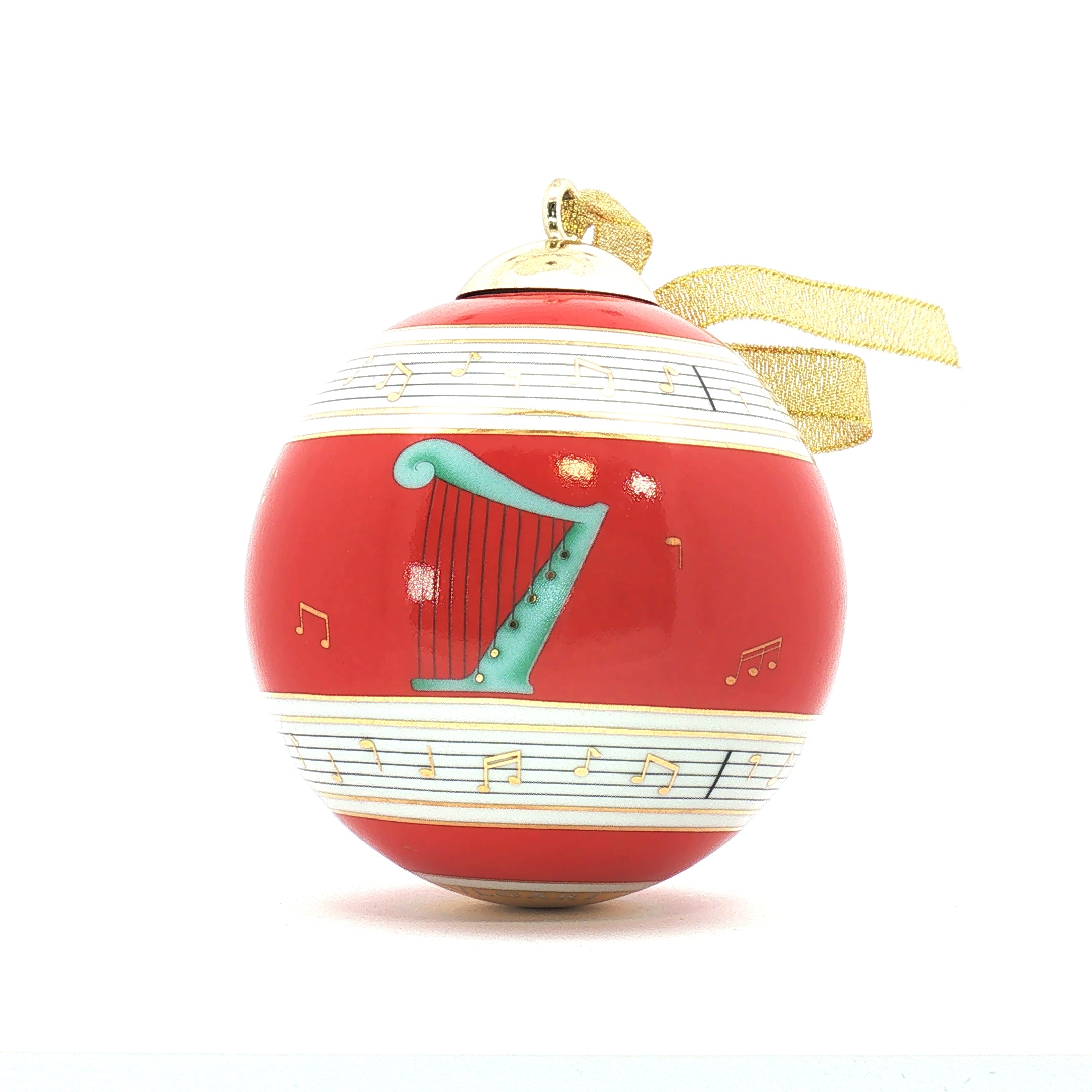 Red Bvlgari x Rosenthal porcelain Christmas ball ornament with musical design, part of Gold & Beyond accessories collection.