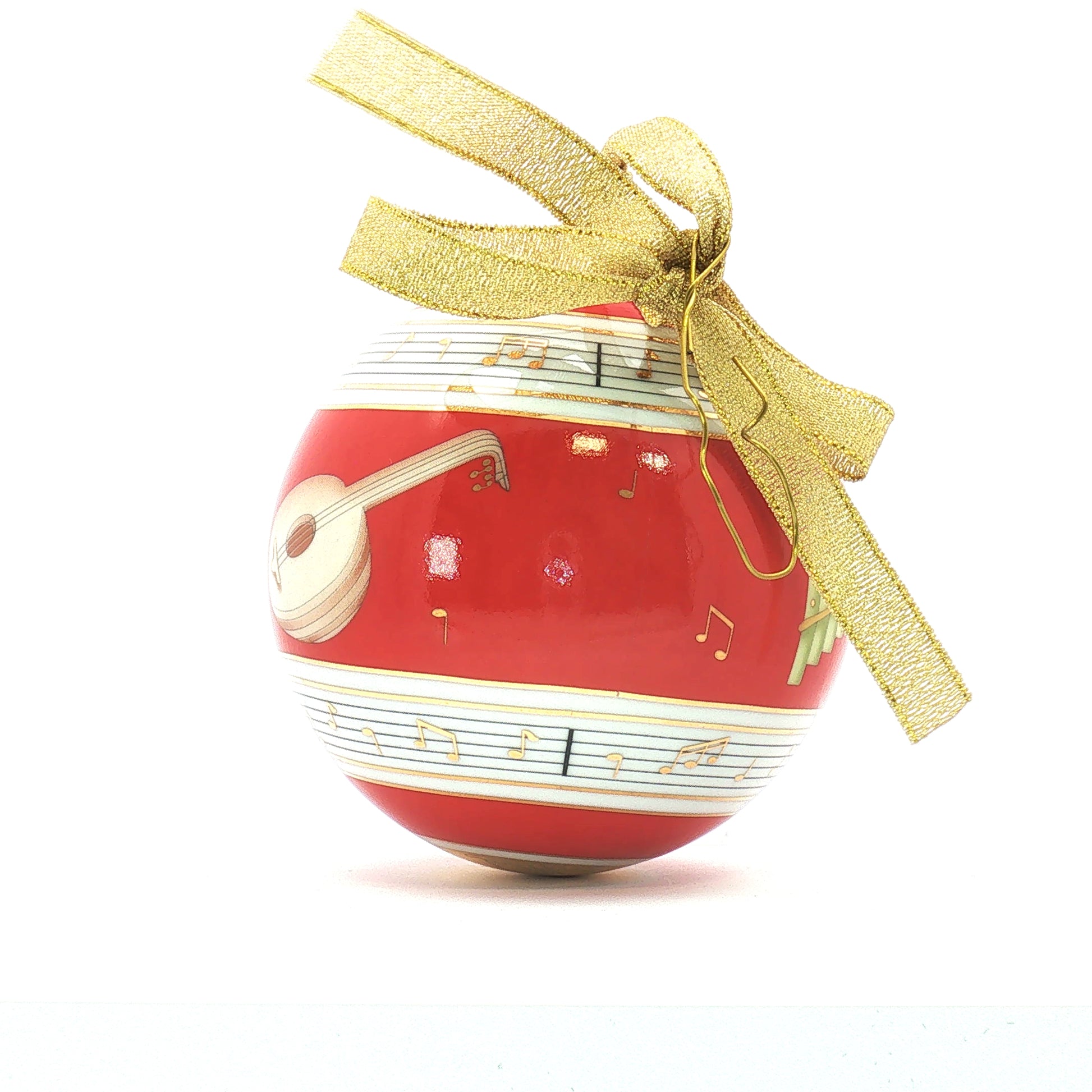 Red Bvlgari x Rosenthal porcelain Christmas ball ornament with musical design, decorative holiday accessory from Gold & Beyond.