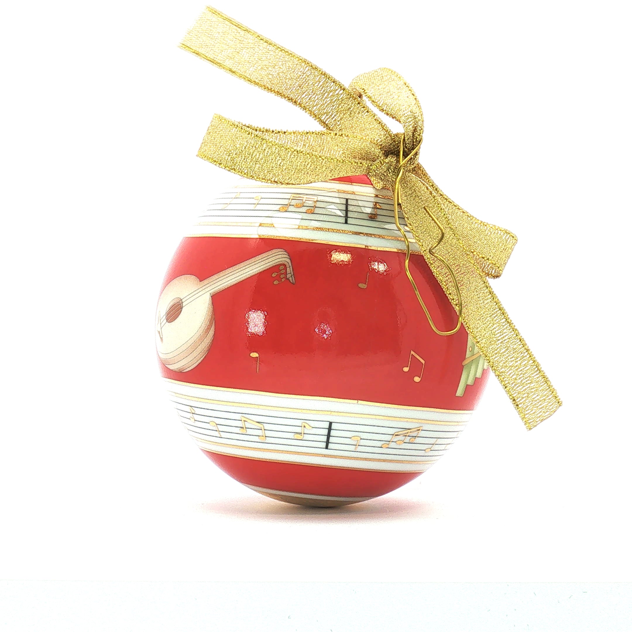 Red Bvlgari x Rosenthal porcelain Christmas ball ornament with musical design, decorative holiday accessory from Gold & Beyond.