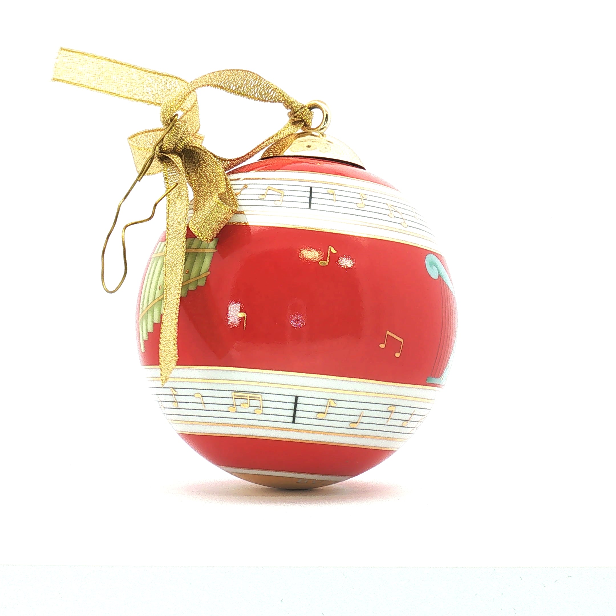 Bvlgari x Rosenthal red porcelain Christmas ball ornament with musical design, decorative holiday accessory.