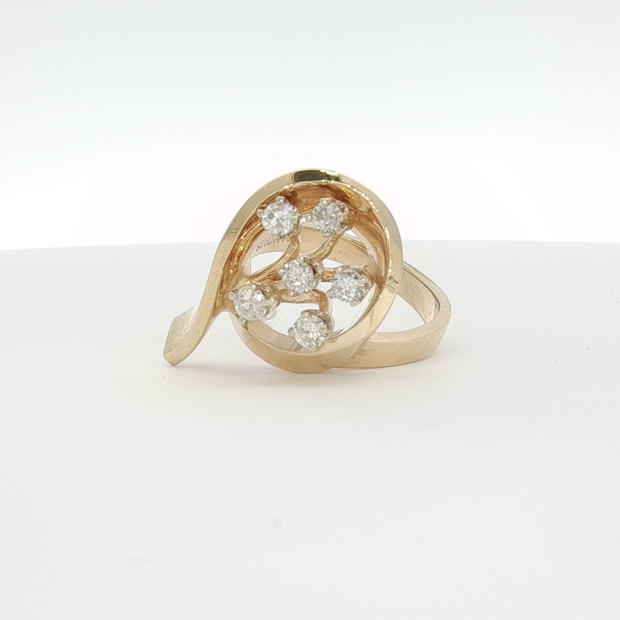 14K yellow gold diamond flower ring with intricate floral design and sparkling diamonds, jewelry piece from Gold & Beyond.