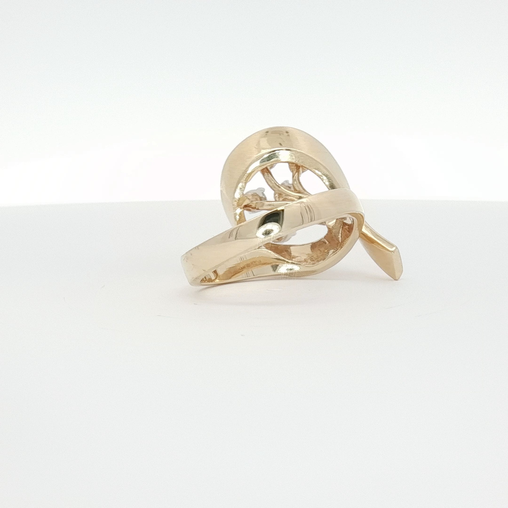 14K yellow gold diamond flower ring with intricate floral design, showcasing sparkling diamonds on a delicate jewelry piece.