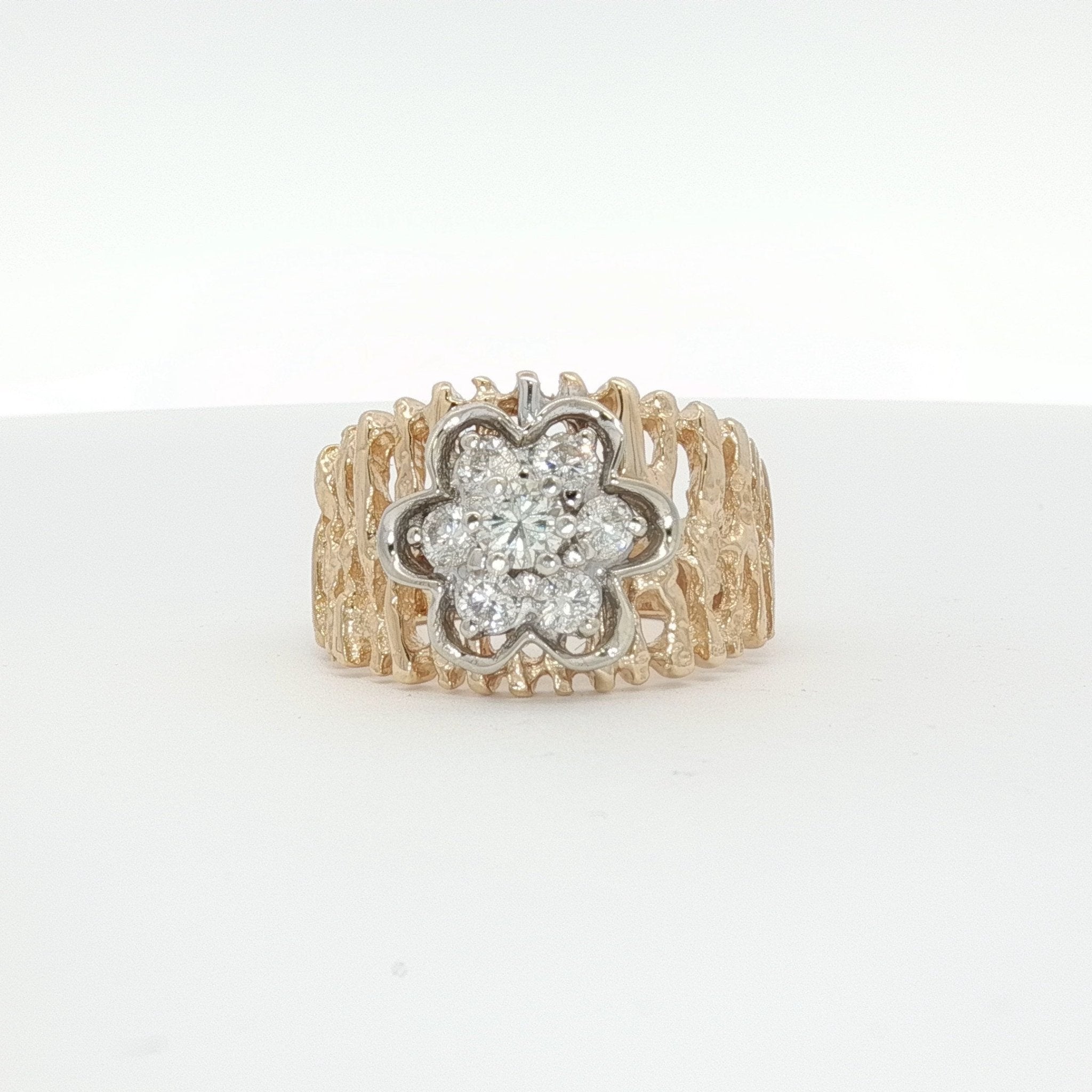 14K yellow gold diamond flower cluster ring with intricate design, showcasing sparkling diamonds and elegant jewelry craftsmanship.