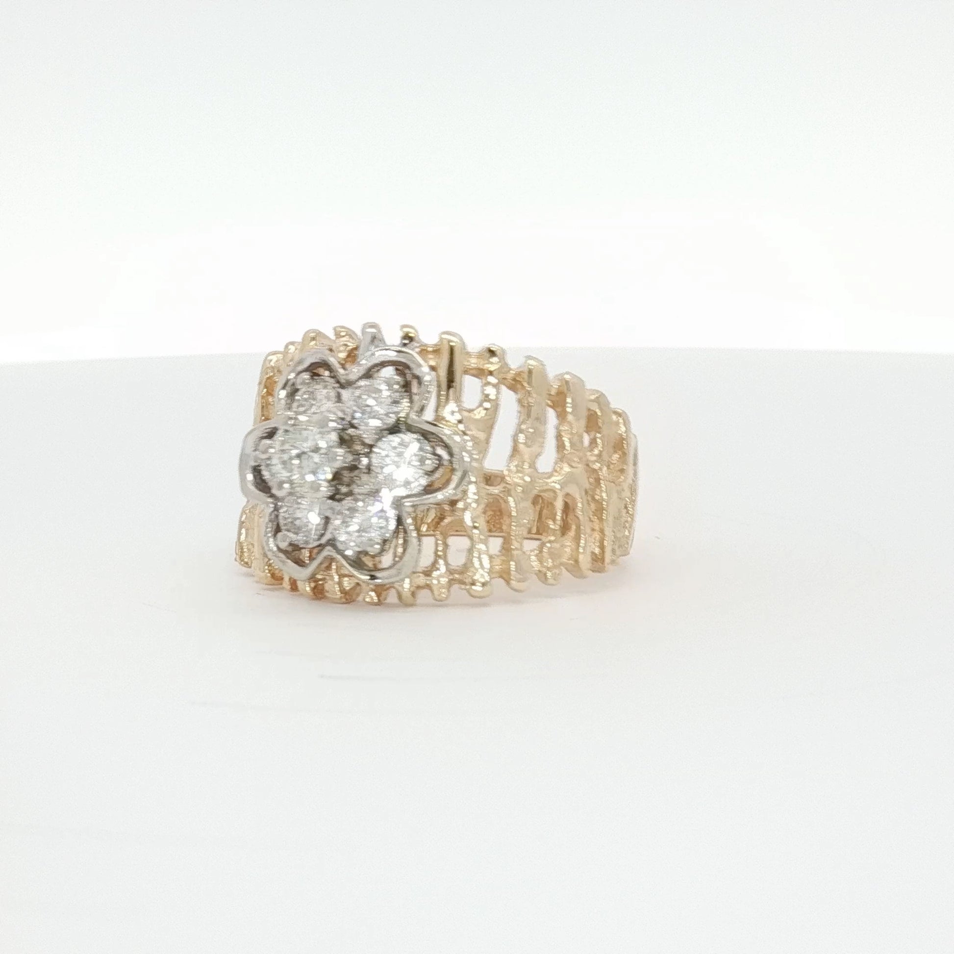 14K yellow gold diamond flower cluster ring with intricate floral design, showcasing sparkling diamonds and elegant craftsmanship.
