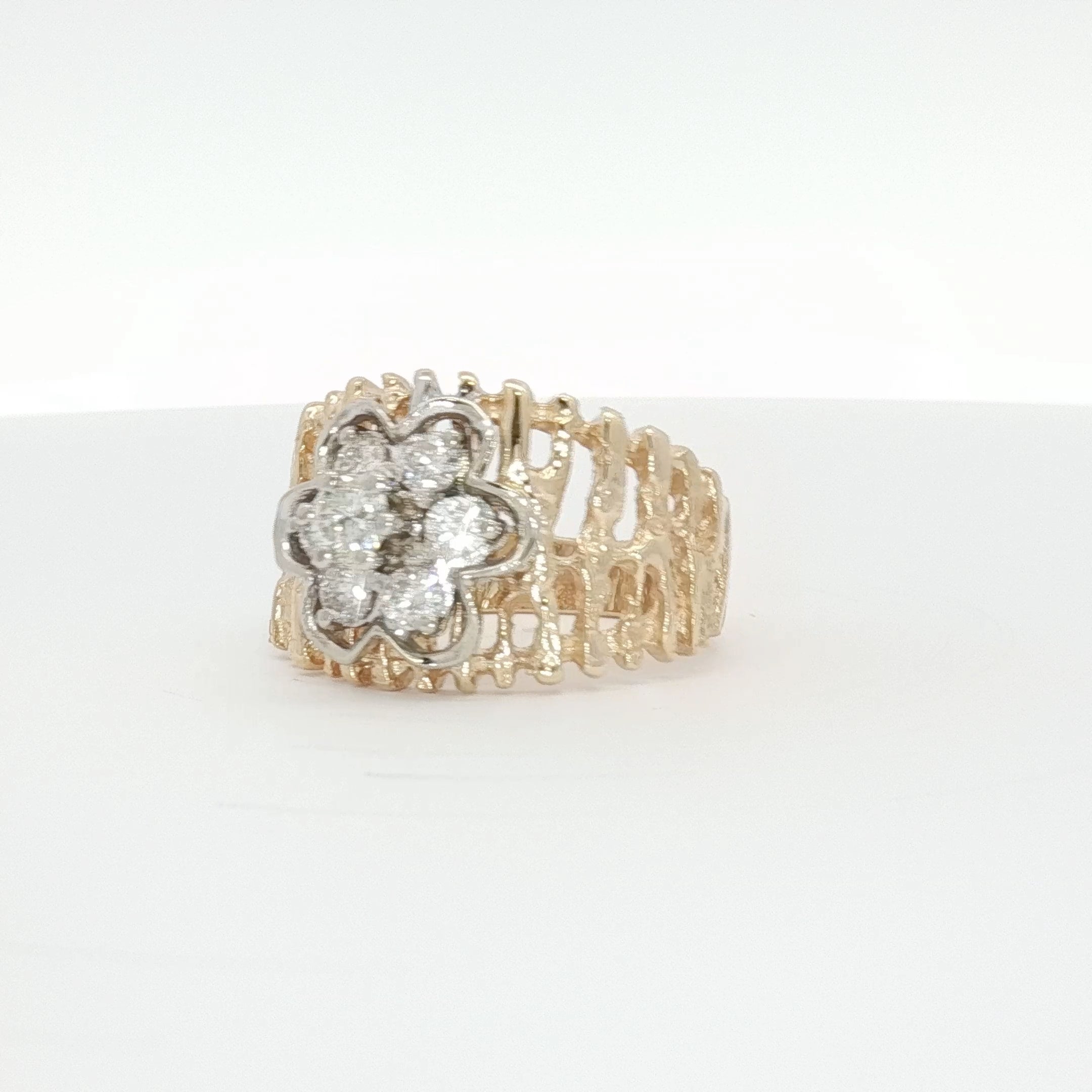 14K yellow gold diamond flower cluster ring with intricate floral design, showcasing sparkling diamonds and elegant craftsmanship.