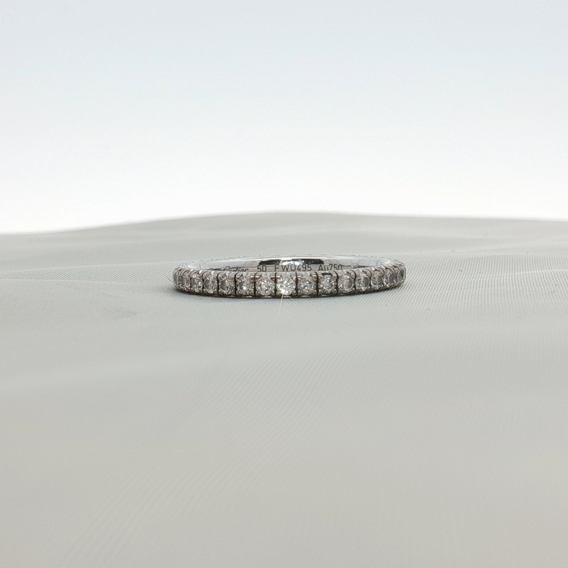 Cartier Love Eternity diamond band ring with multiple sparkling diamonds, crafted for elegant jewelry style.