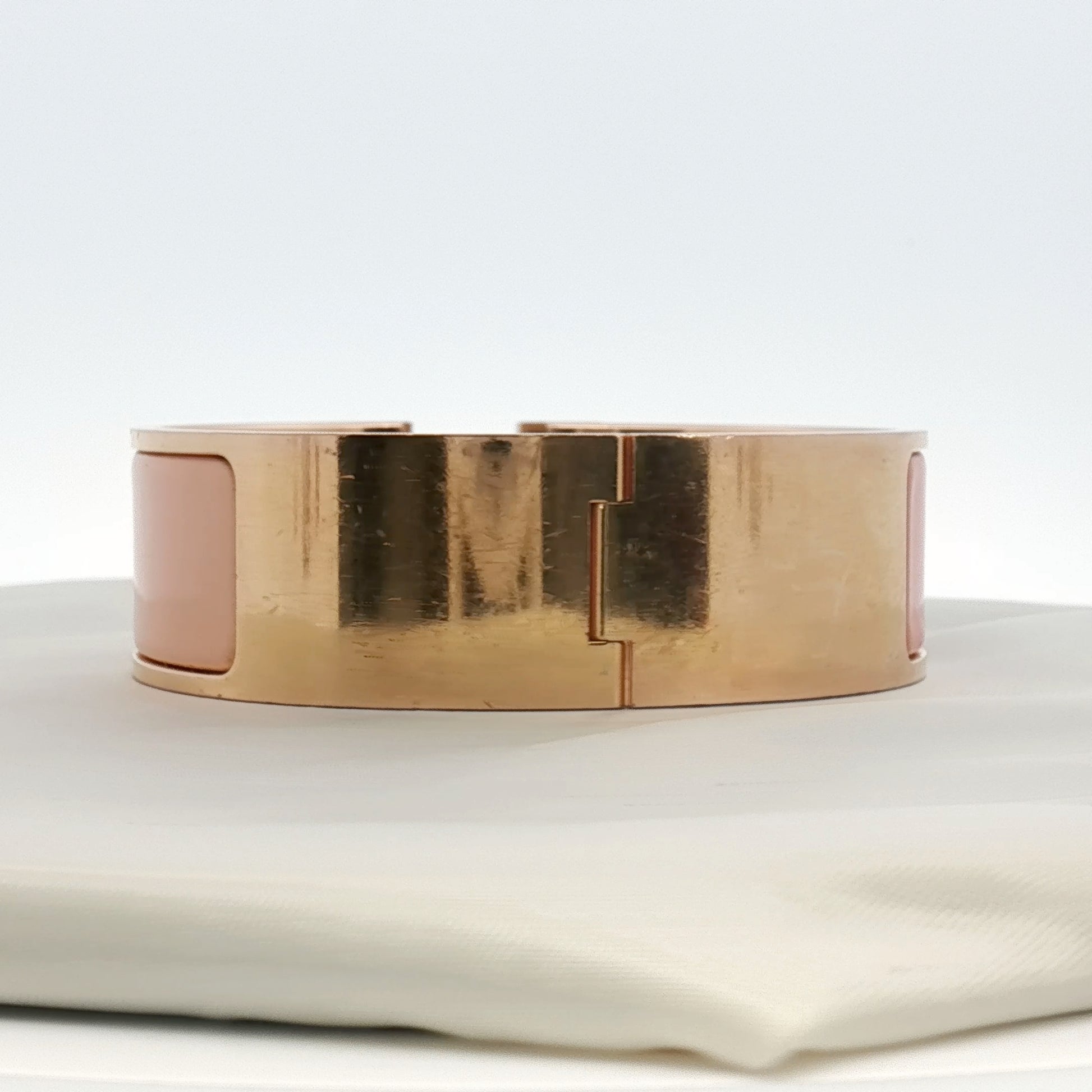 Hermès Wide H bracelet from Gold & Beyond jewelry collection, featuring a gold-tone design with a bold H-shaped clasp.